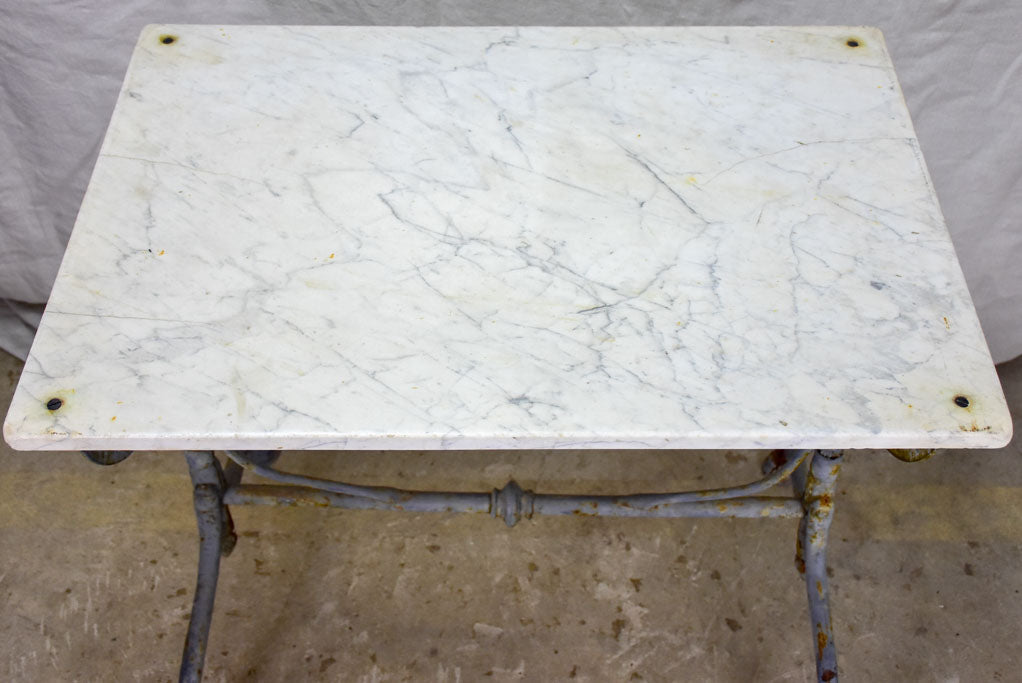 Small 19th Century rectangular garden table with marble top and blue iron base 22¾" x 32¼"