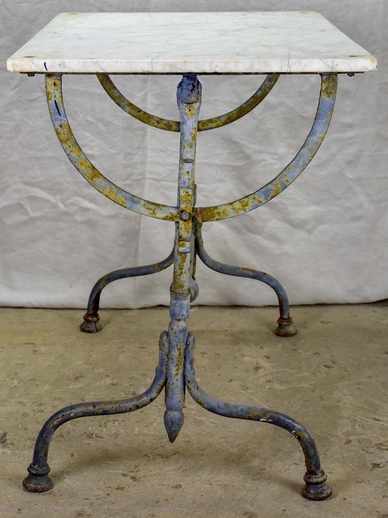 Small 19th Century rectangular garden table with marble top and blue iron base 22¾" x 32¼"