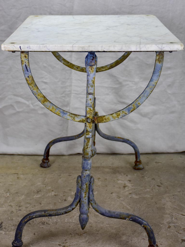 Small 19th Century rectangular garden table with marble top and blue iron base 22¾" x 32¼"