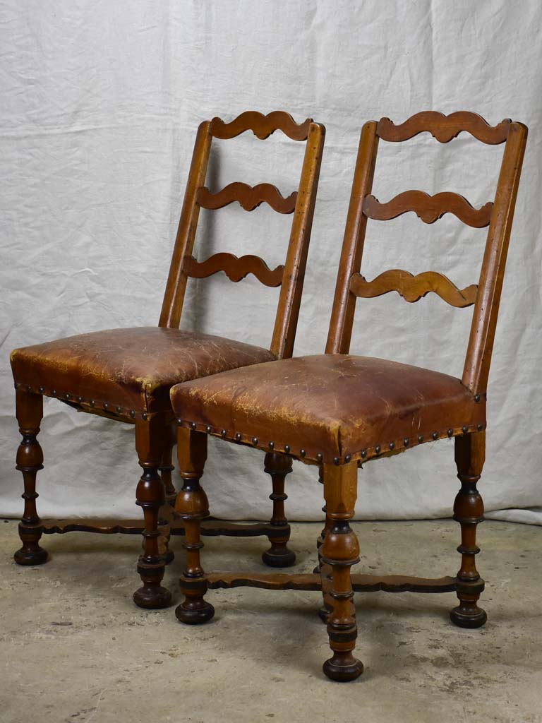 Pair of 17th Century Swiss walnut and leather chairs