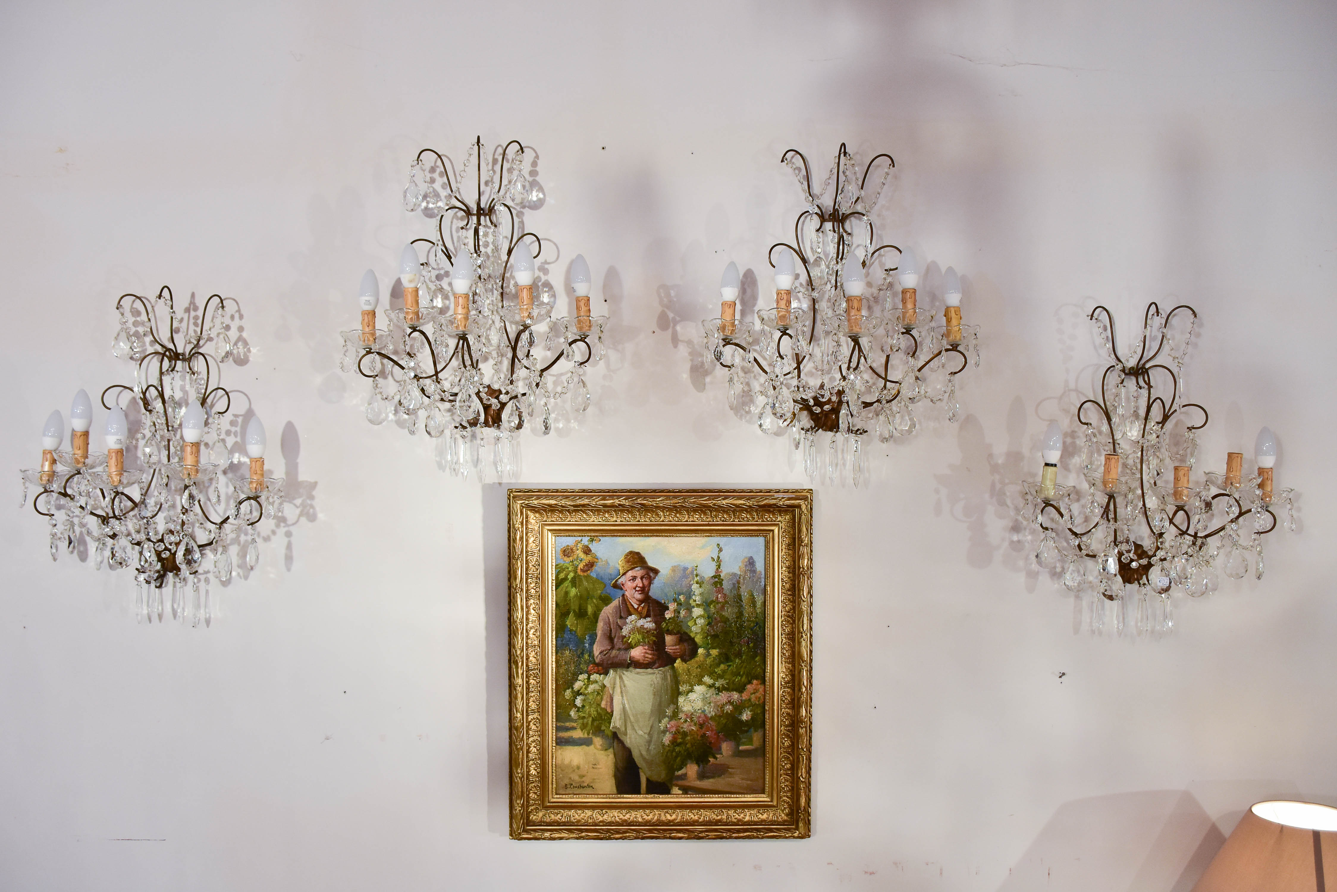 Set of four antique crystal wall sconces