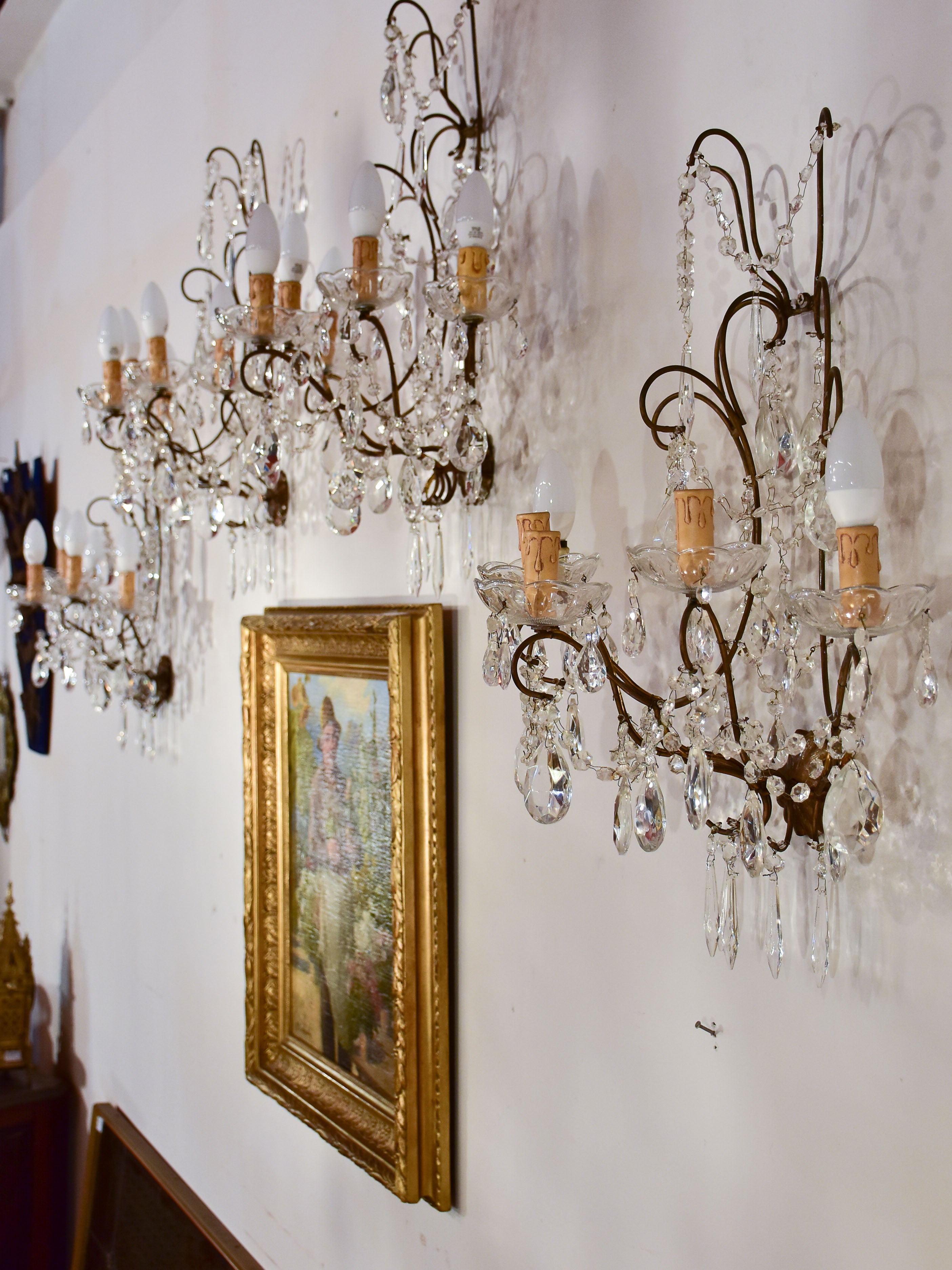Set of four antique crystal wall sconces
