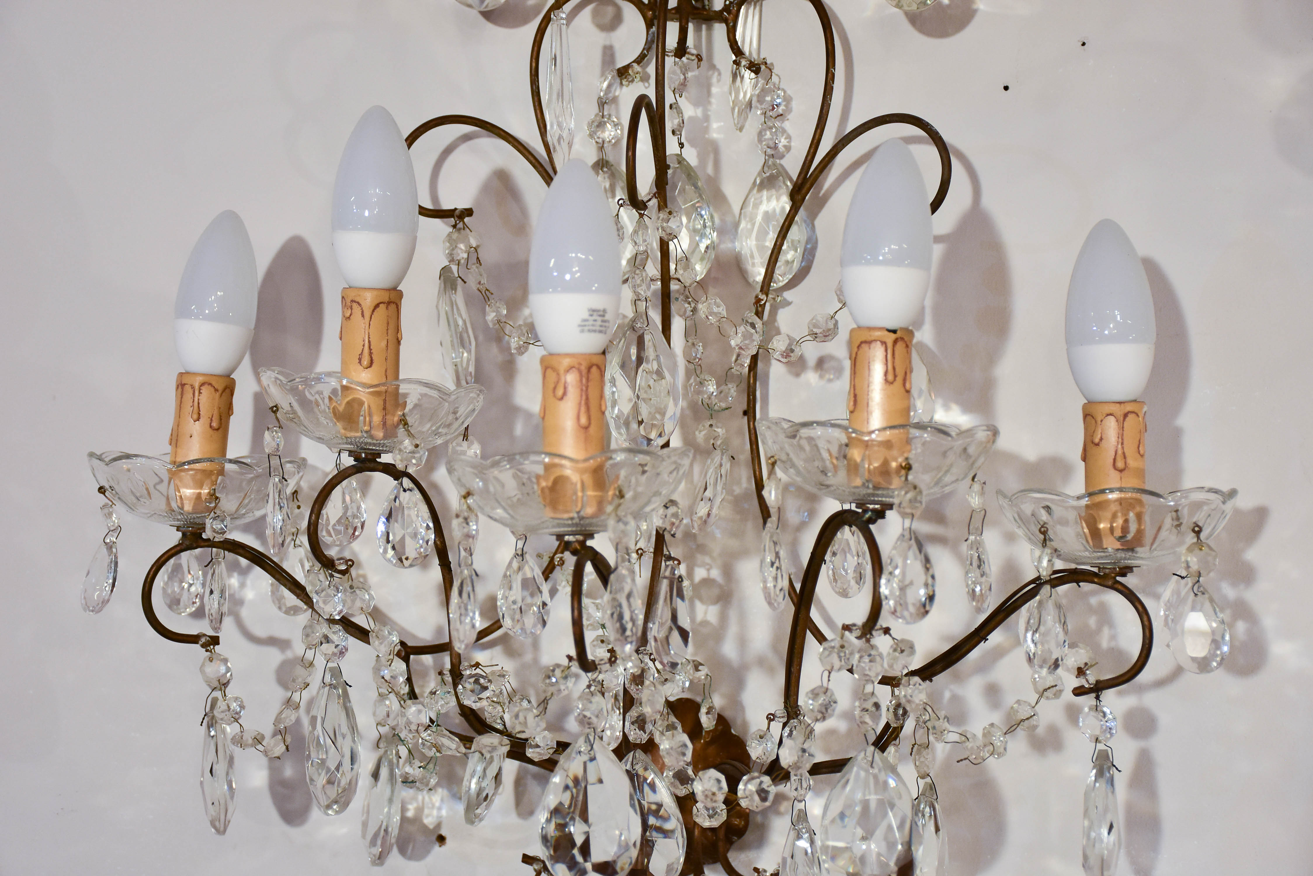 Set of four antique crystal wall sconces