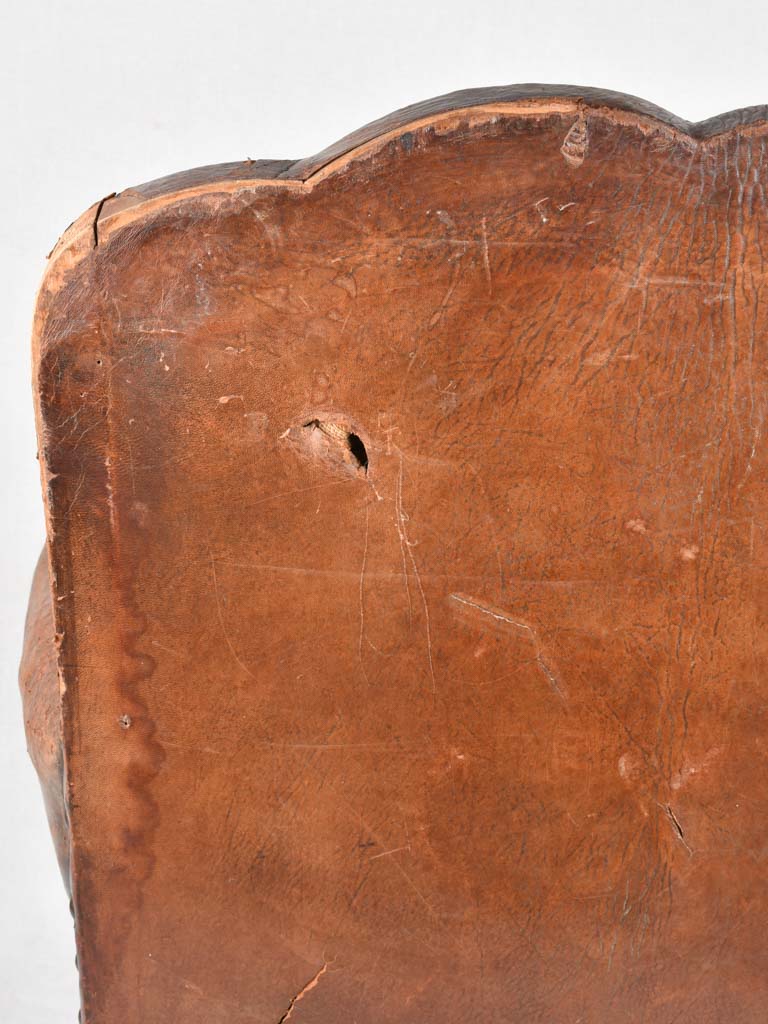 Rustic French leather club chair