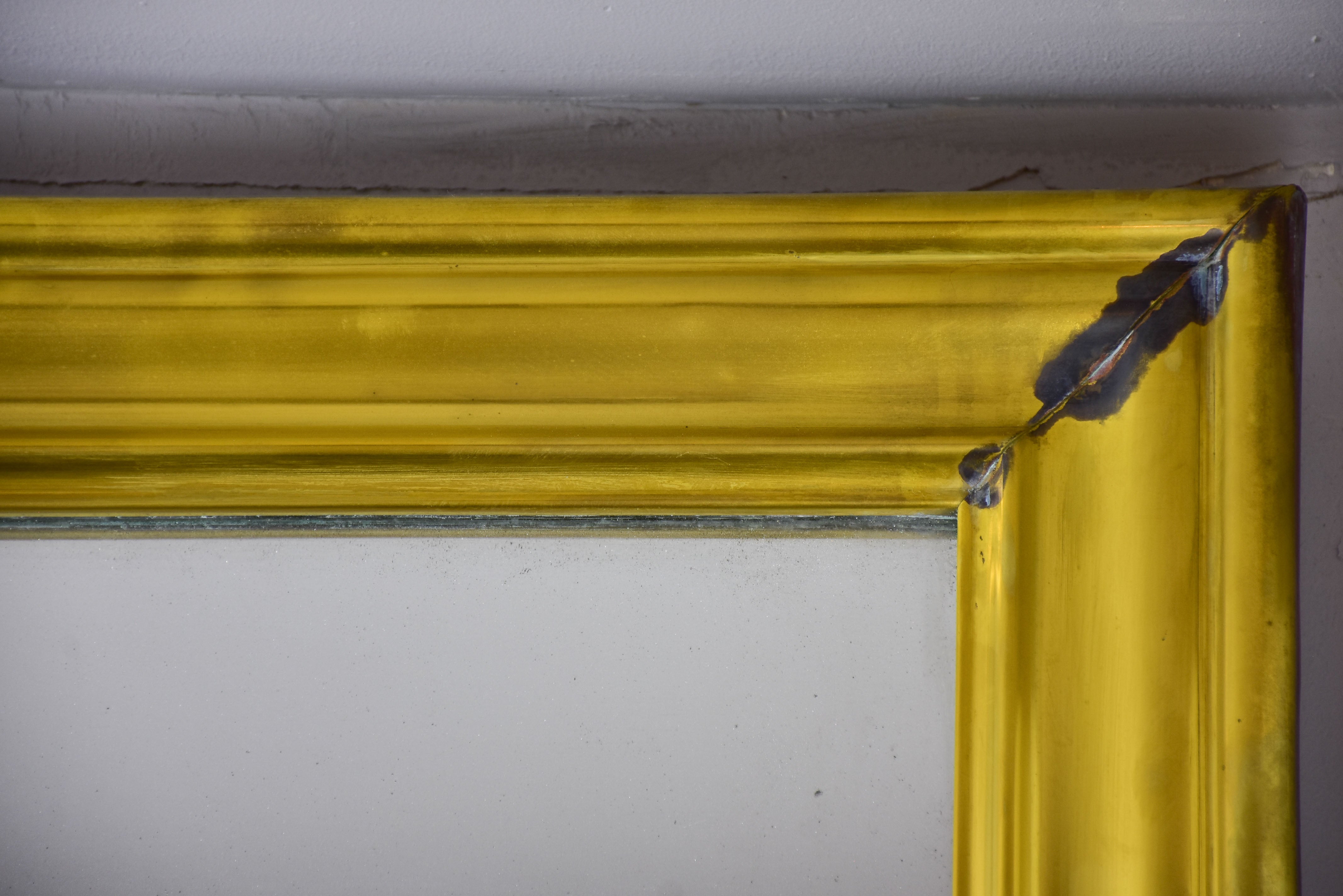 Antique French bistro mirror with brass frame