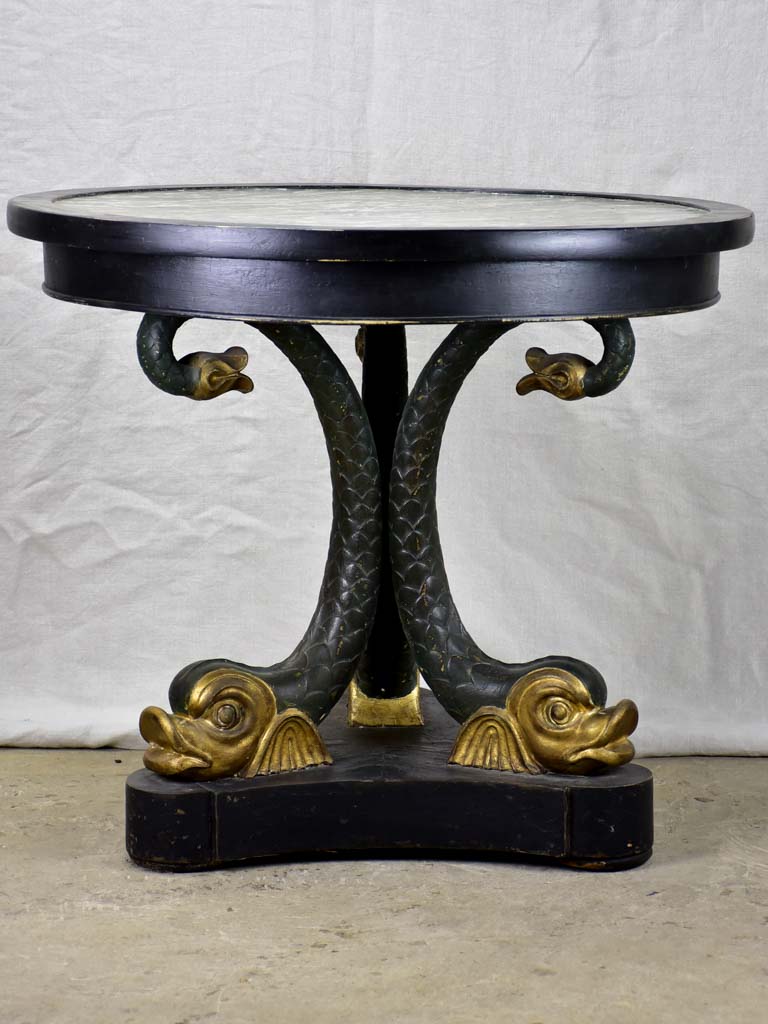 Gold leaf dolphin-based old table