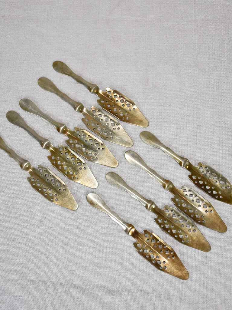 Collection of 9 absinthe spoons from the early twentieth-century