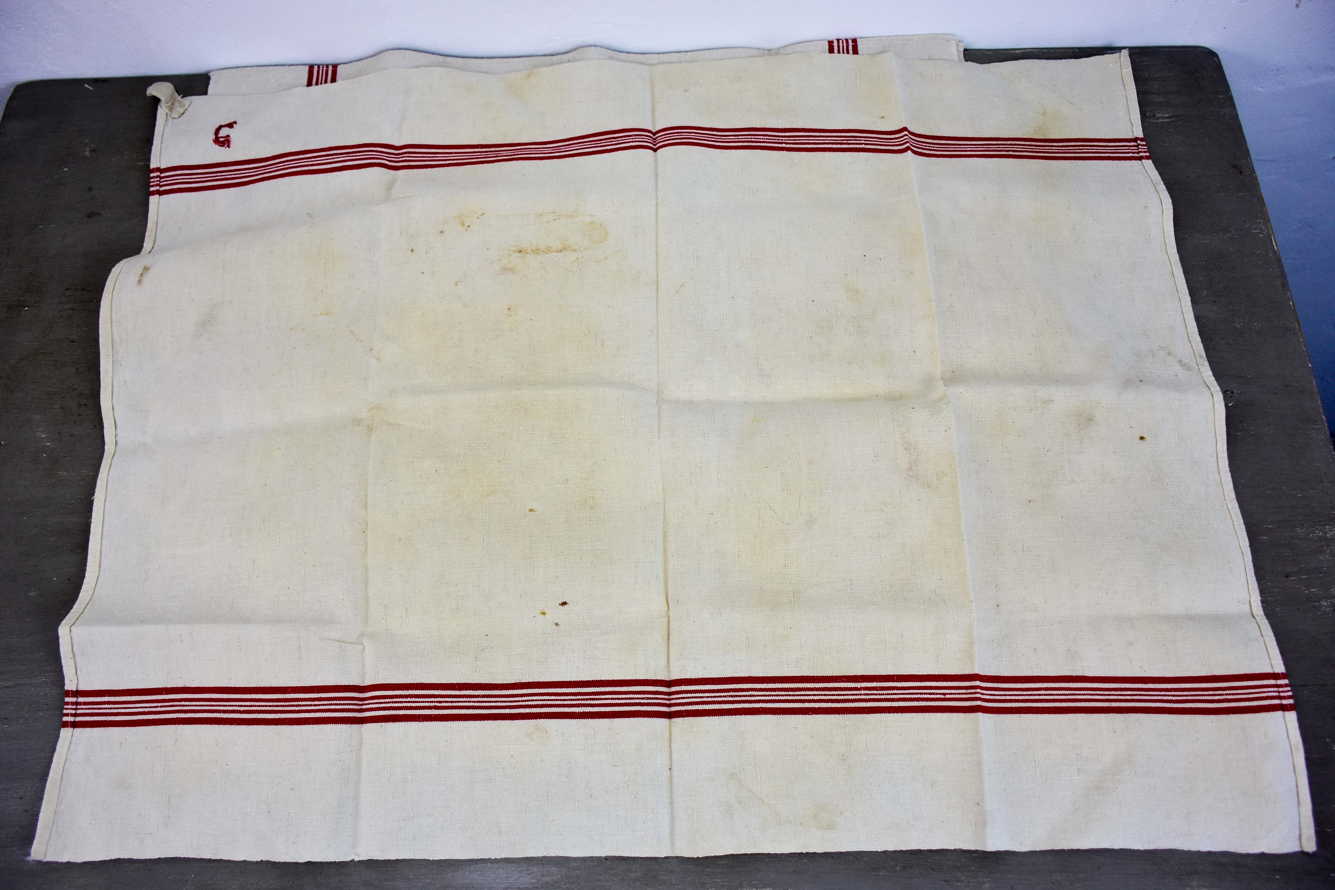 Four vintage French tea towels with AM monogram