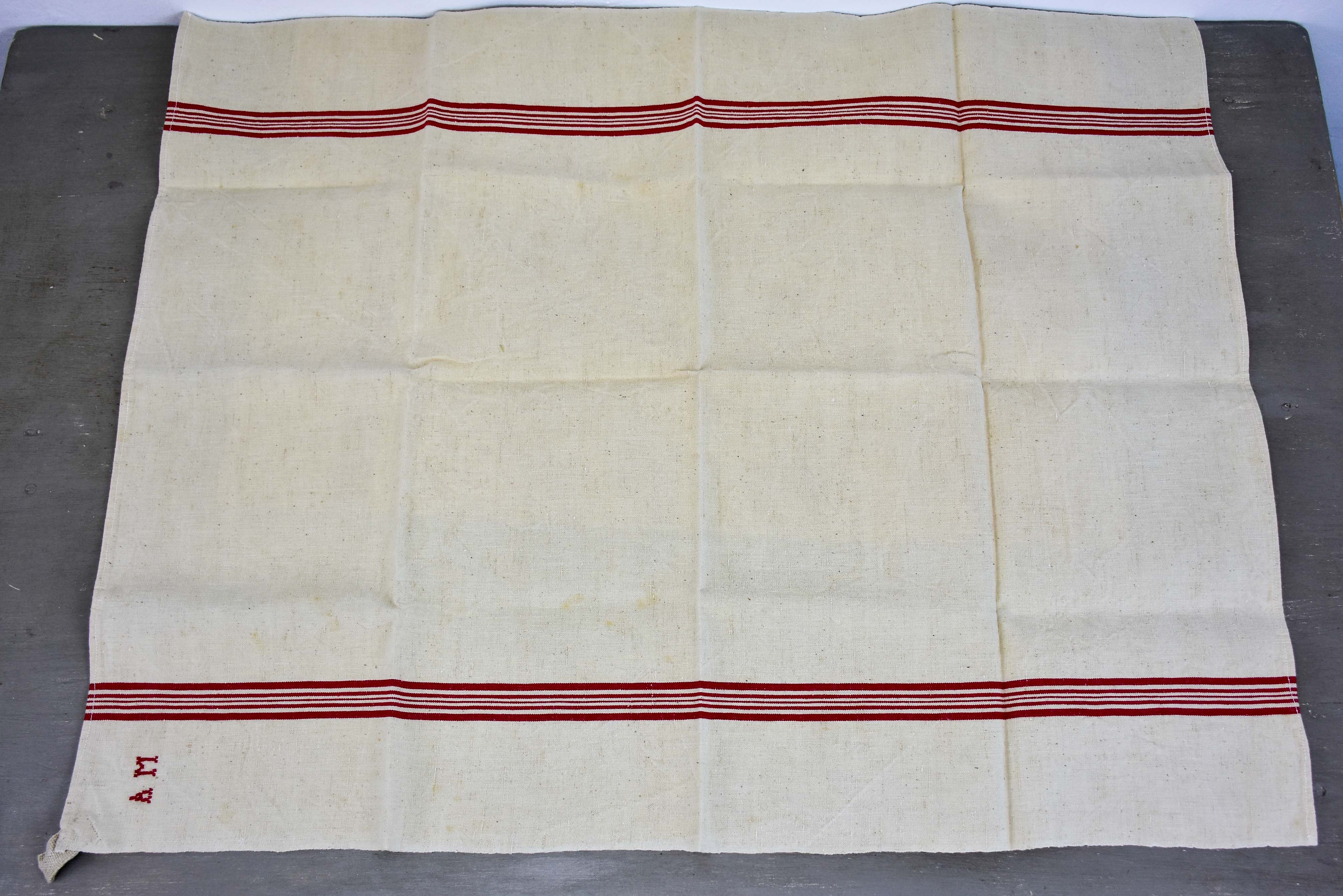 Four vintage French tea towels with AM monogram