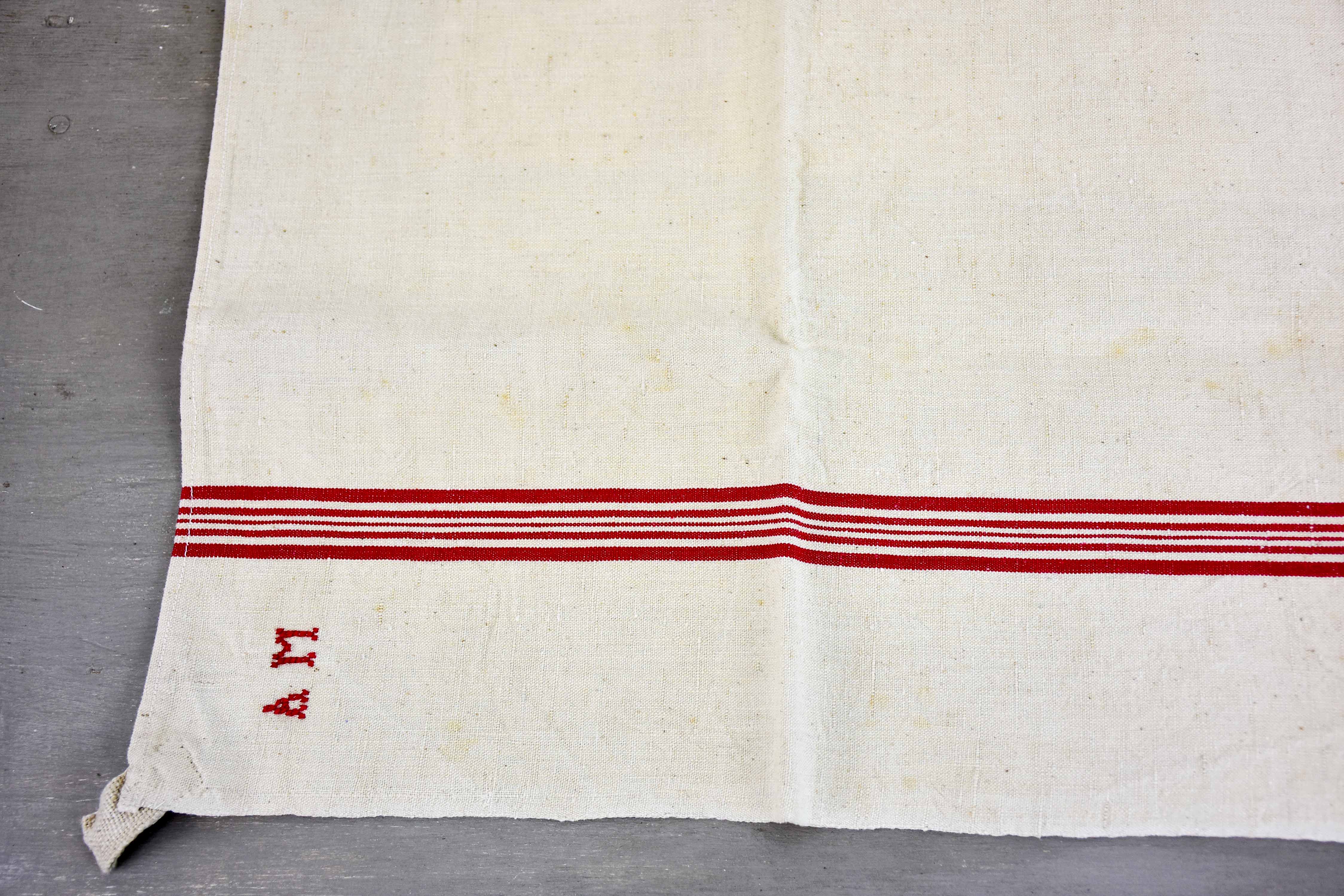 Four vintage French tea towels with AM monogram