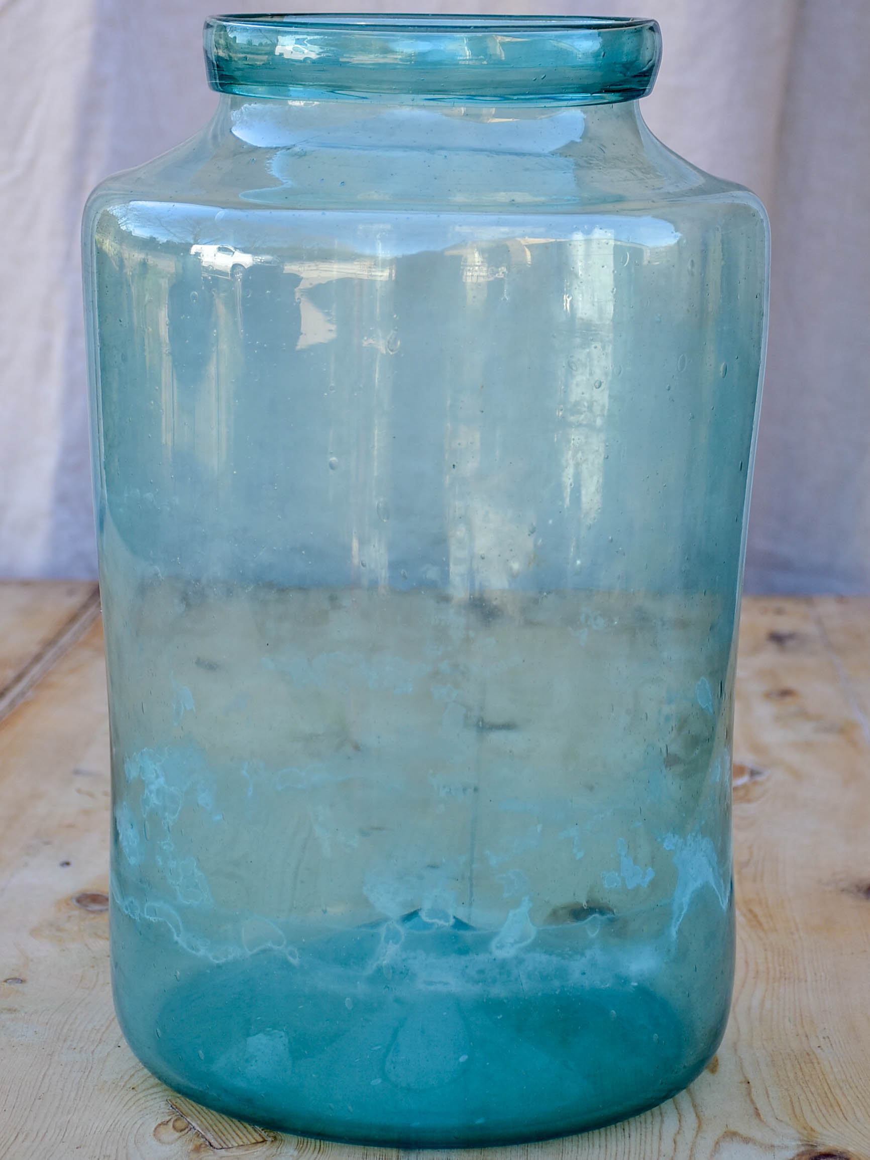 Large antique French preserving jar with aqua glass