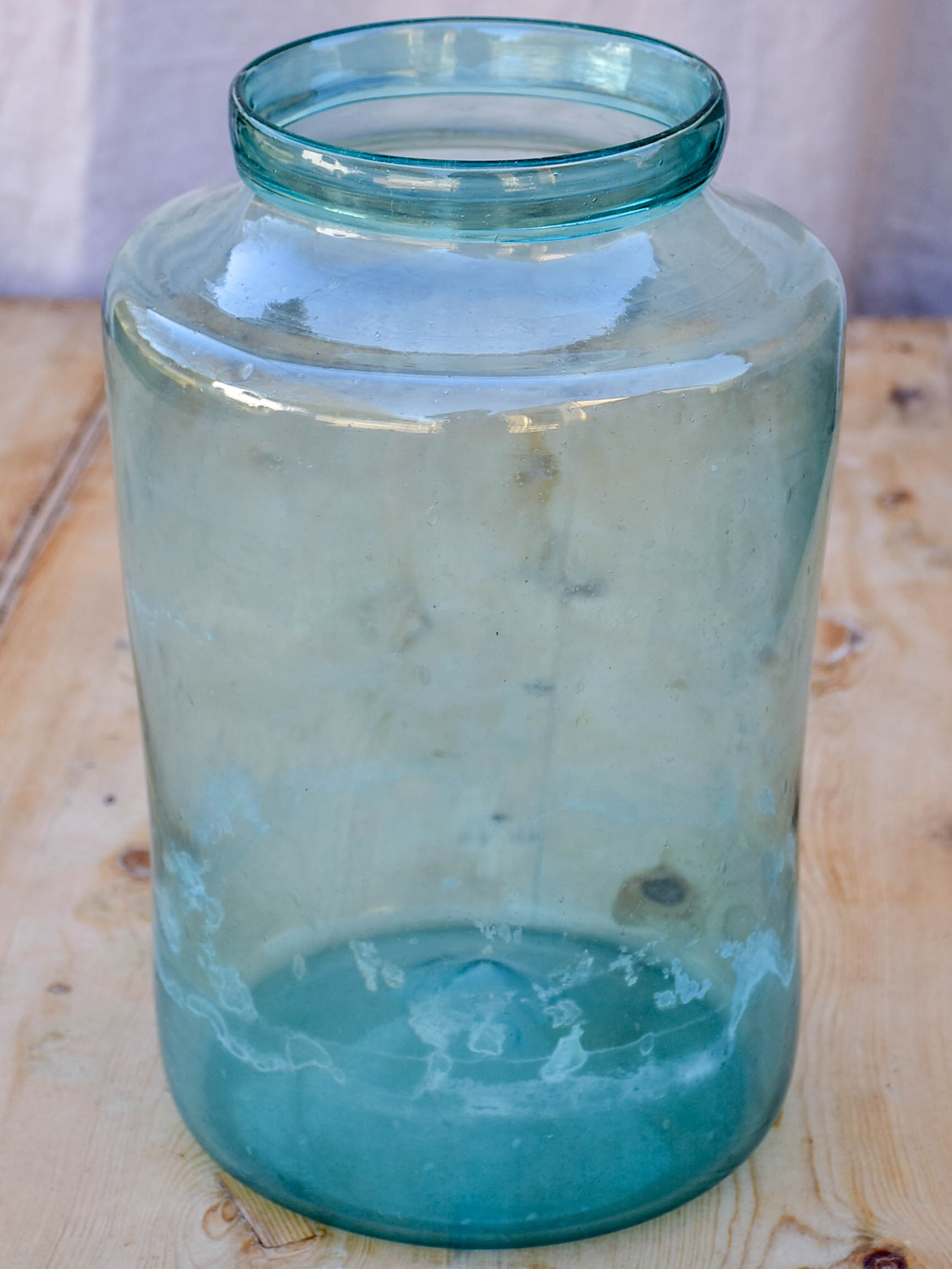 Large antique French preserving jar with aqua glass