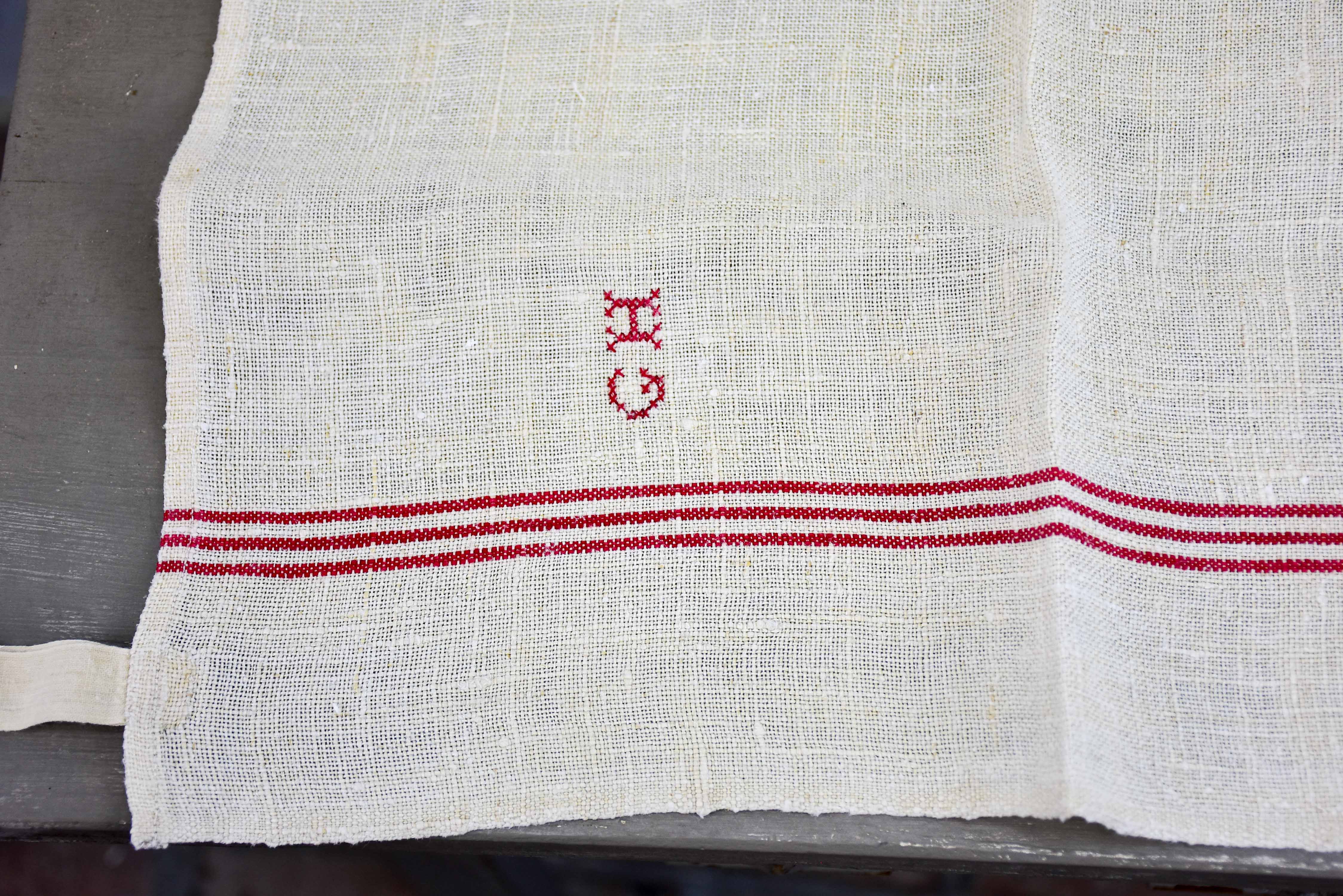 Four French tea towels with GH monogram