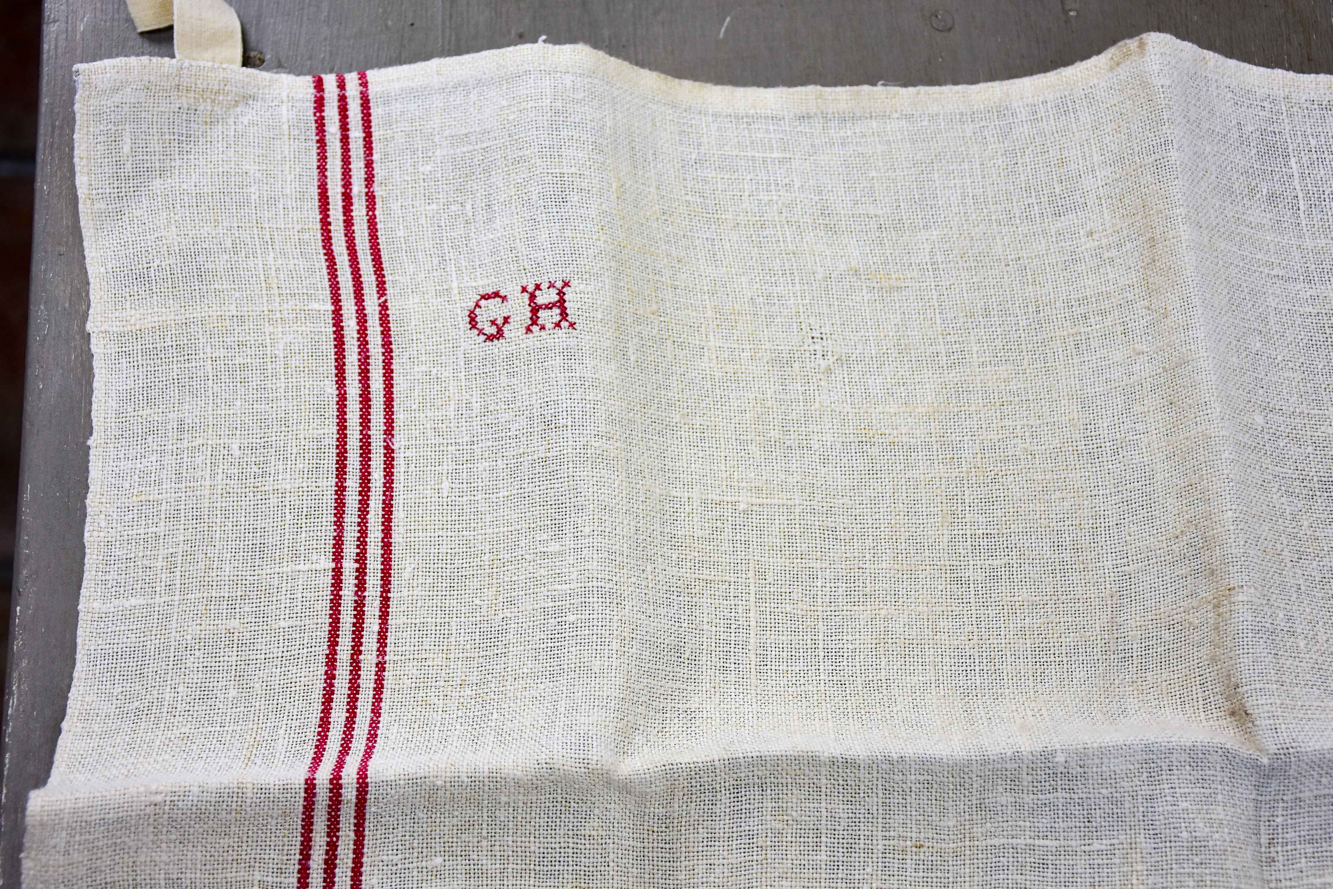 Four French tea towels with GH monogram