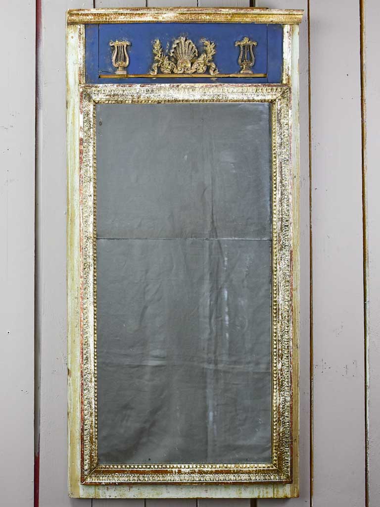 Pretty Louis XVI trumeau mirror with navy blue and fatigued gilding 25½" x 53½"