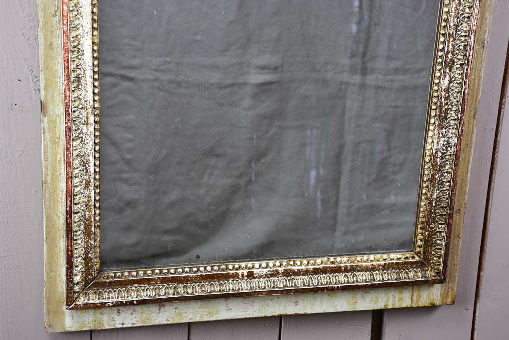 Pretty Louis XVI trumeau mirror with navy blue and fatigued gilding 25½" x 53½"