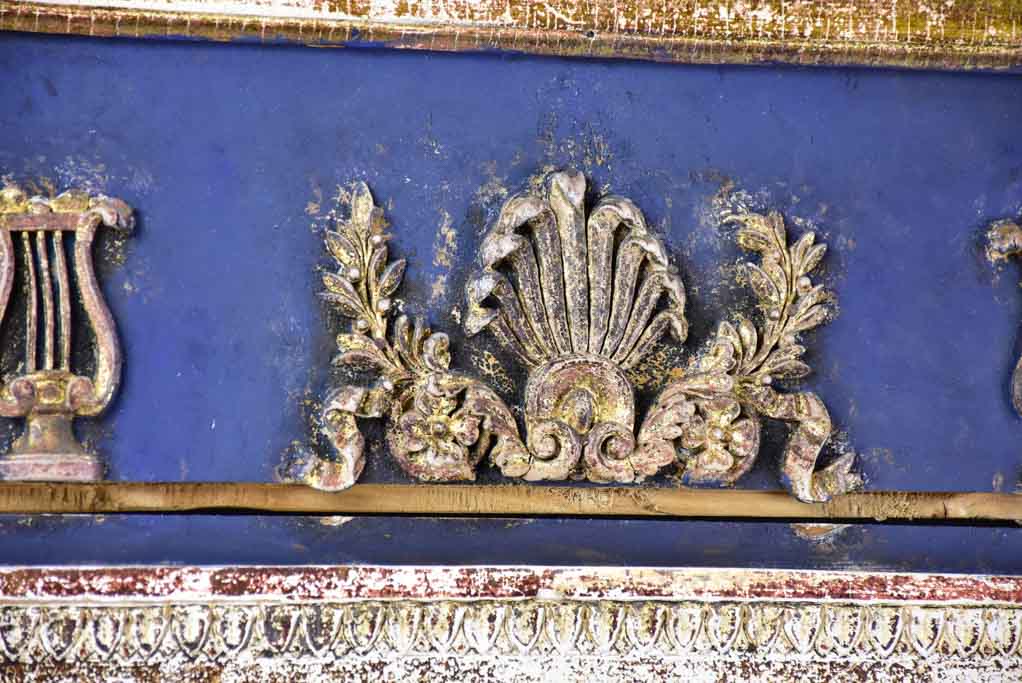 Pretty Louis XVI trumeau mirror with navy blue and fatigued gilding 25½" x 53½"