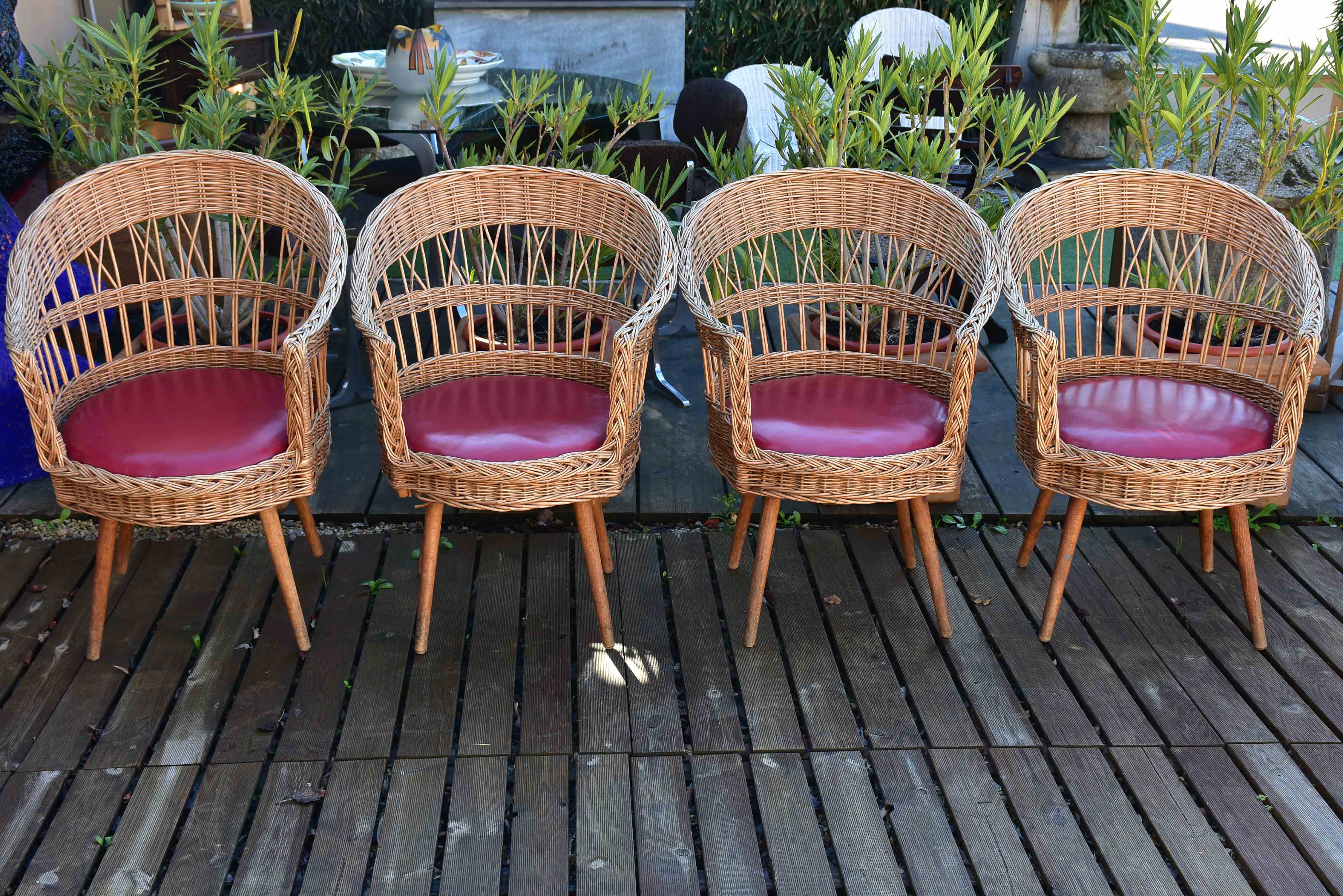 Four vintage French rattan armchairs