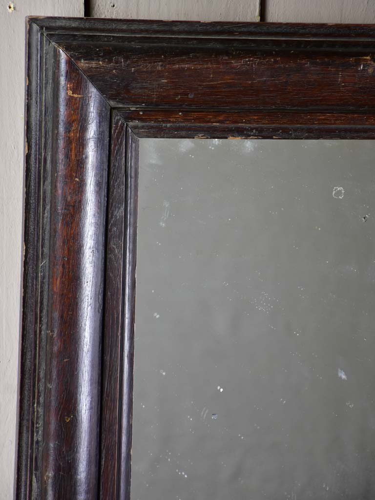 Late 19th Century French mirror with dark timber frame 22¾" x 28¼"