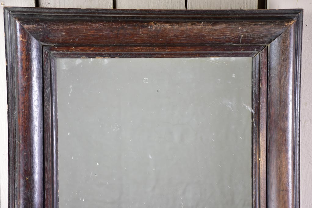 Late 19th Century French mirror with dark timber frame 22¾" x 28¼"