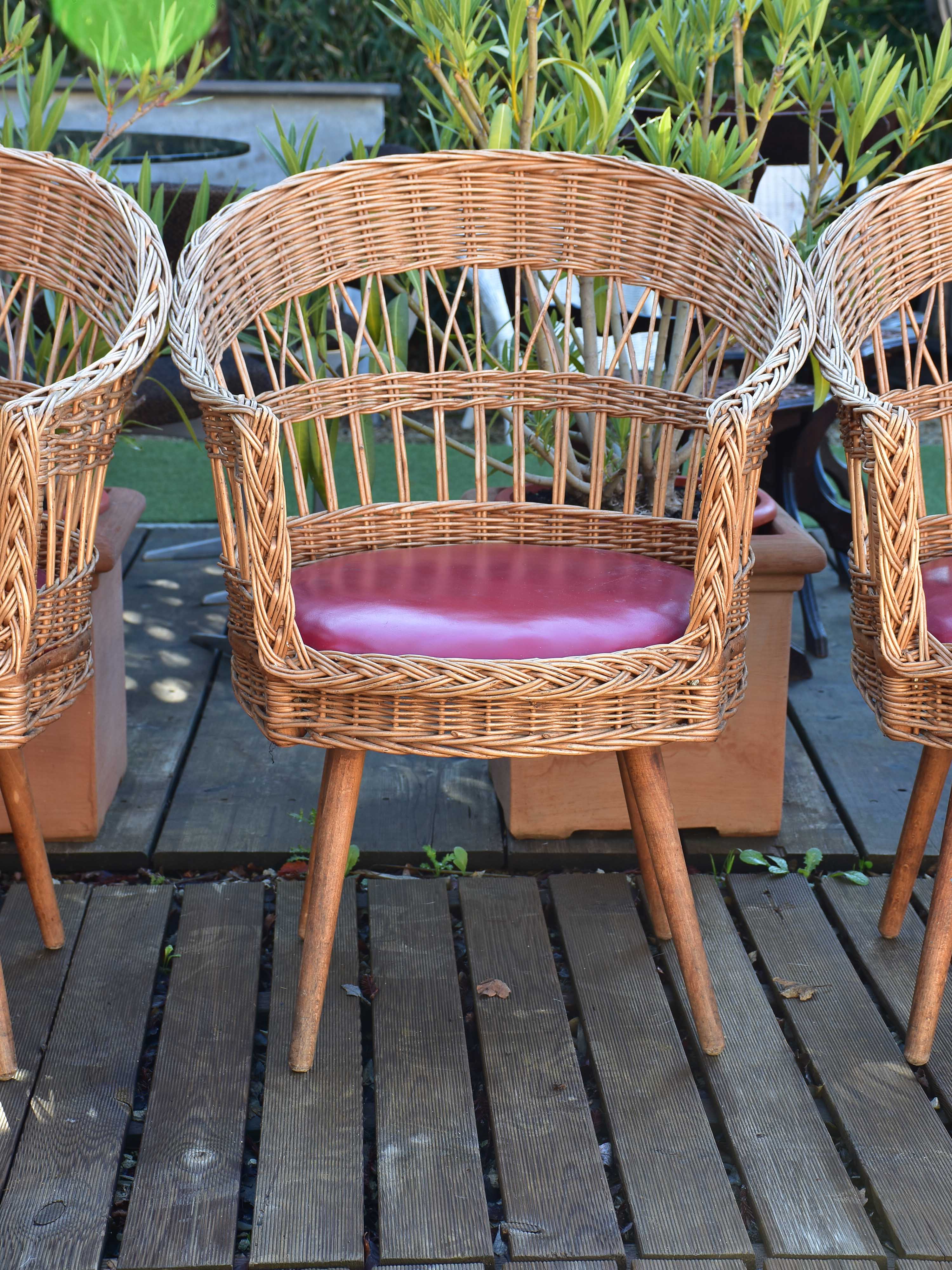 Four vintage French rattan armchairs