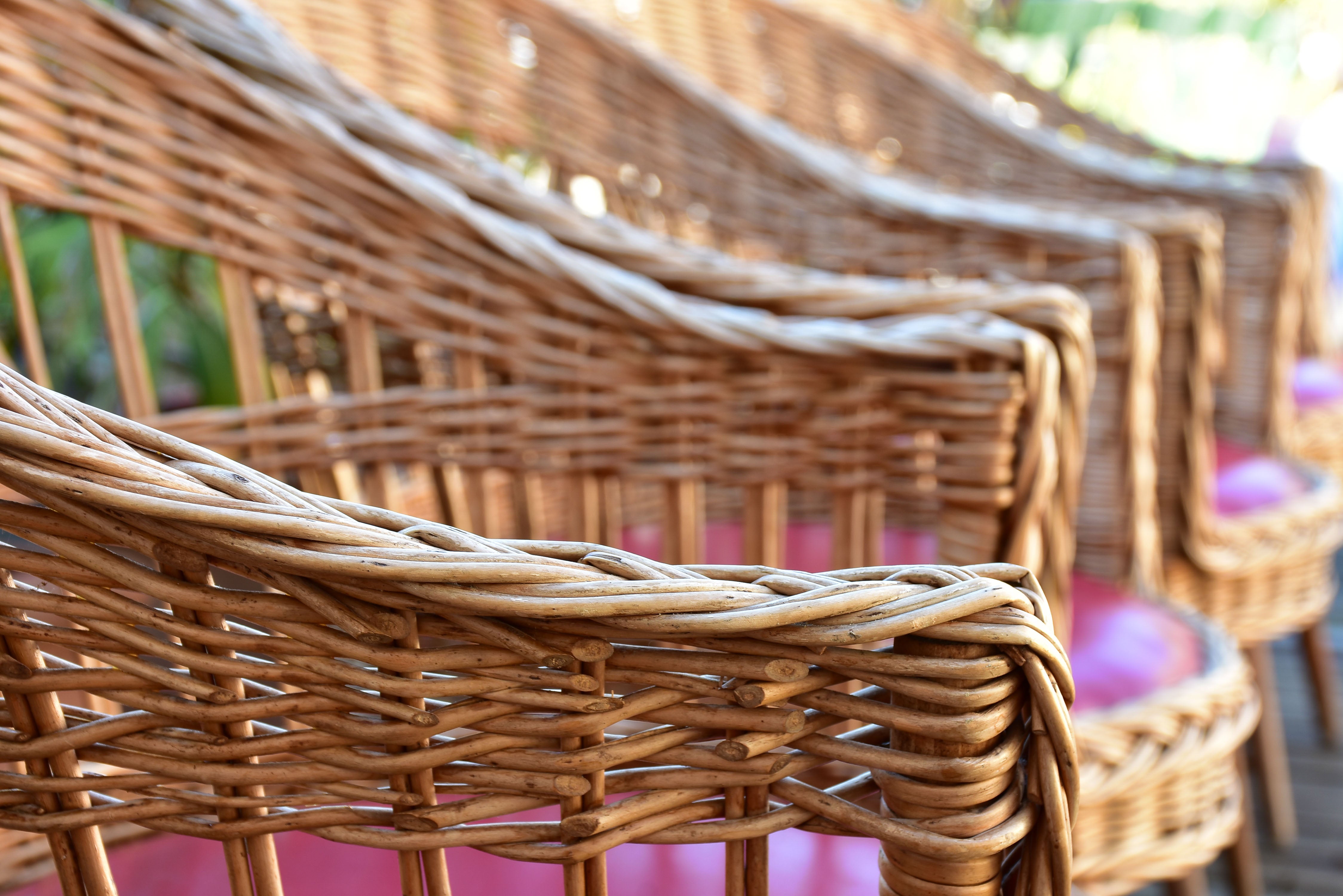 Four vintage French rattan armchairs