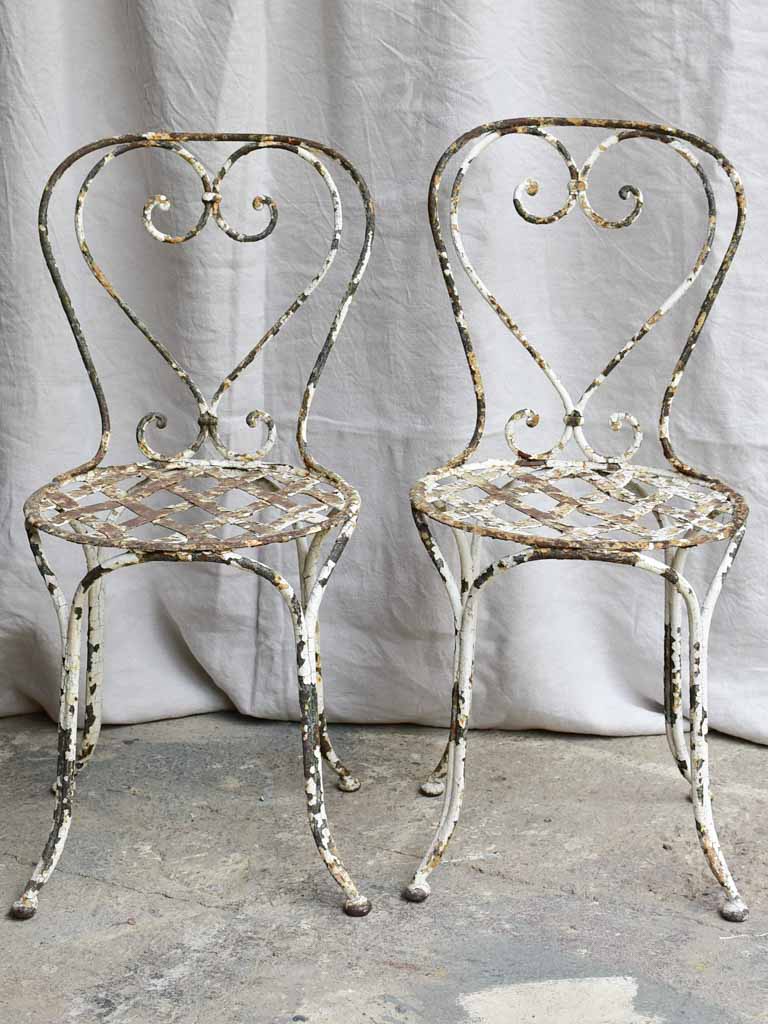 Three antique French garden chairs - heart backrest with lattice seat