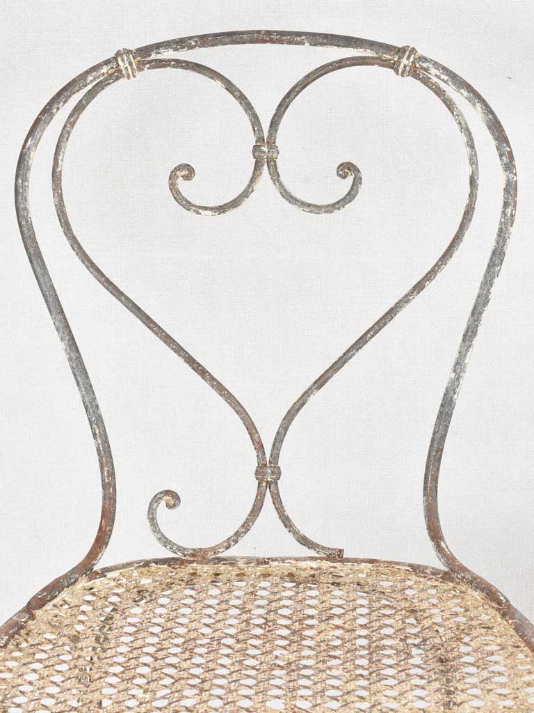 Pair of antique heart back garden chairs