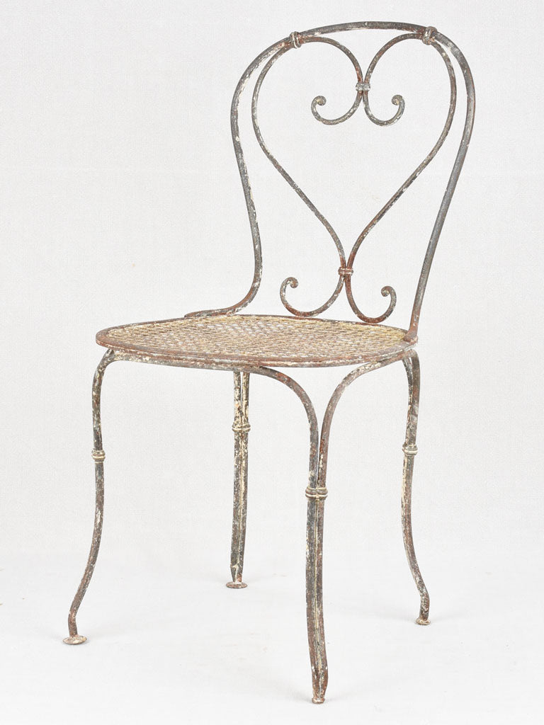 Pair of antique heart back garden chairs