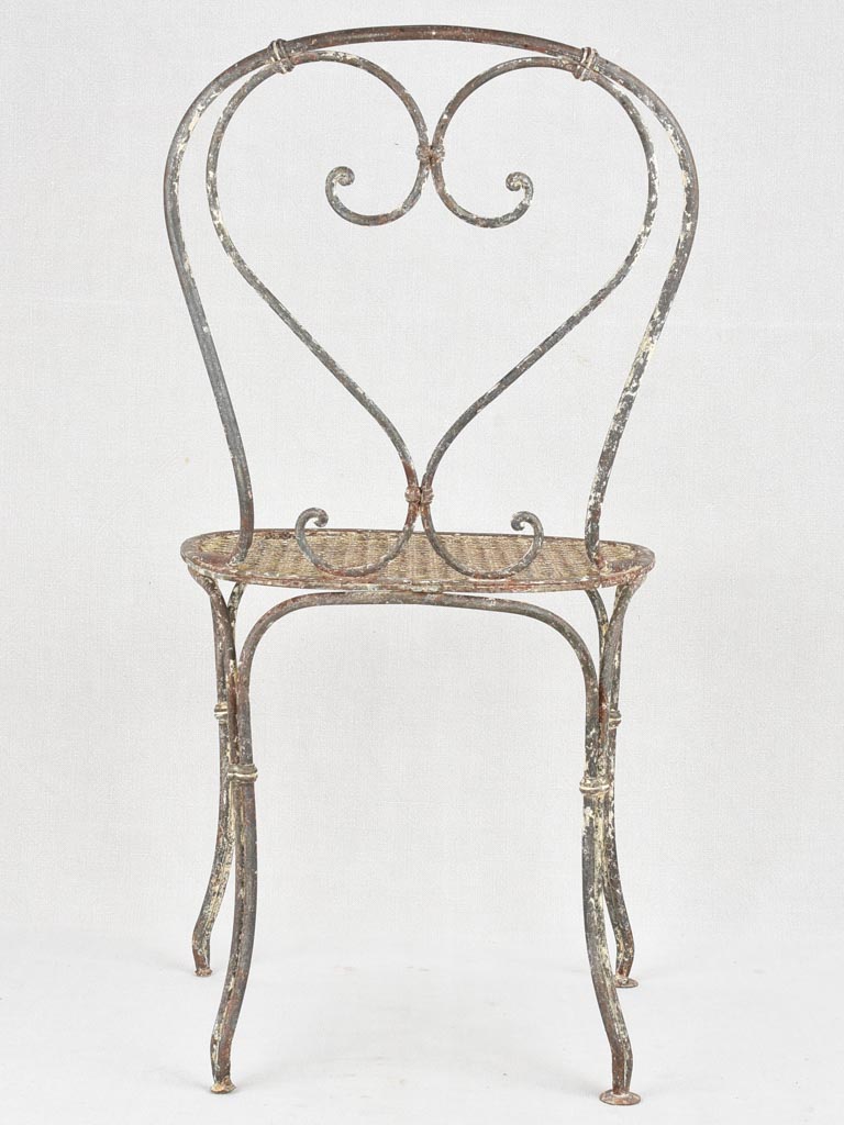 Pair of antique heart back garden chairs