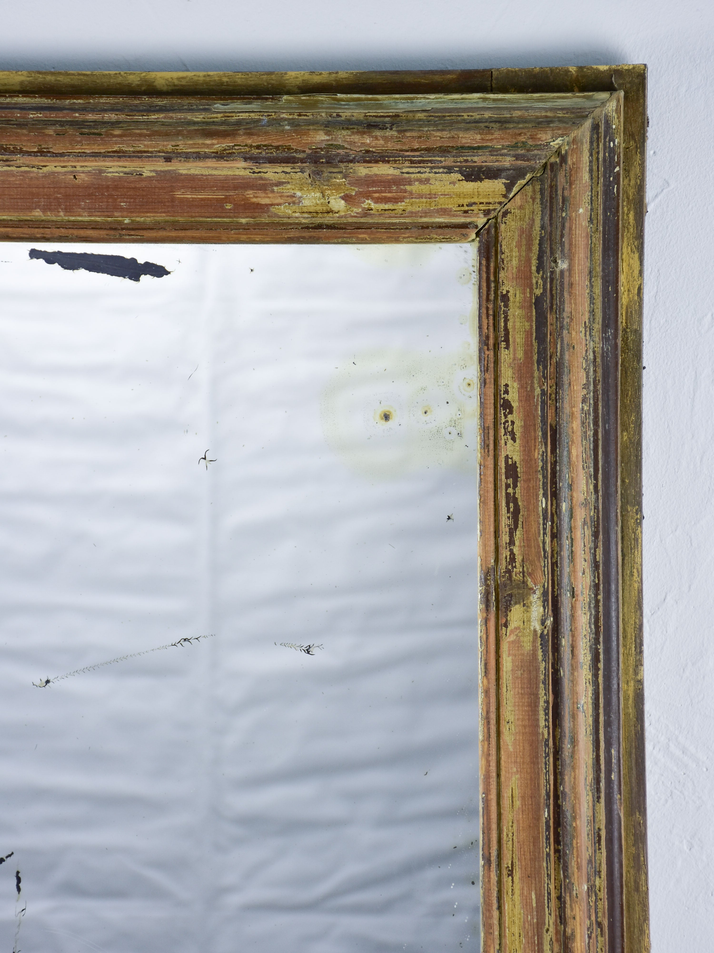 Rustic antique French mirror with dark rectangular frame