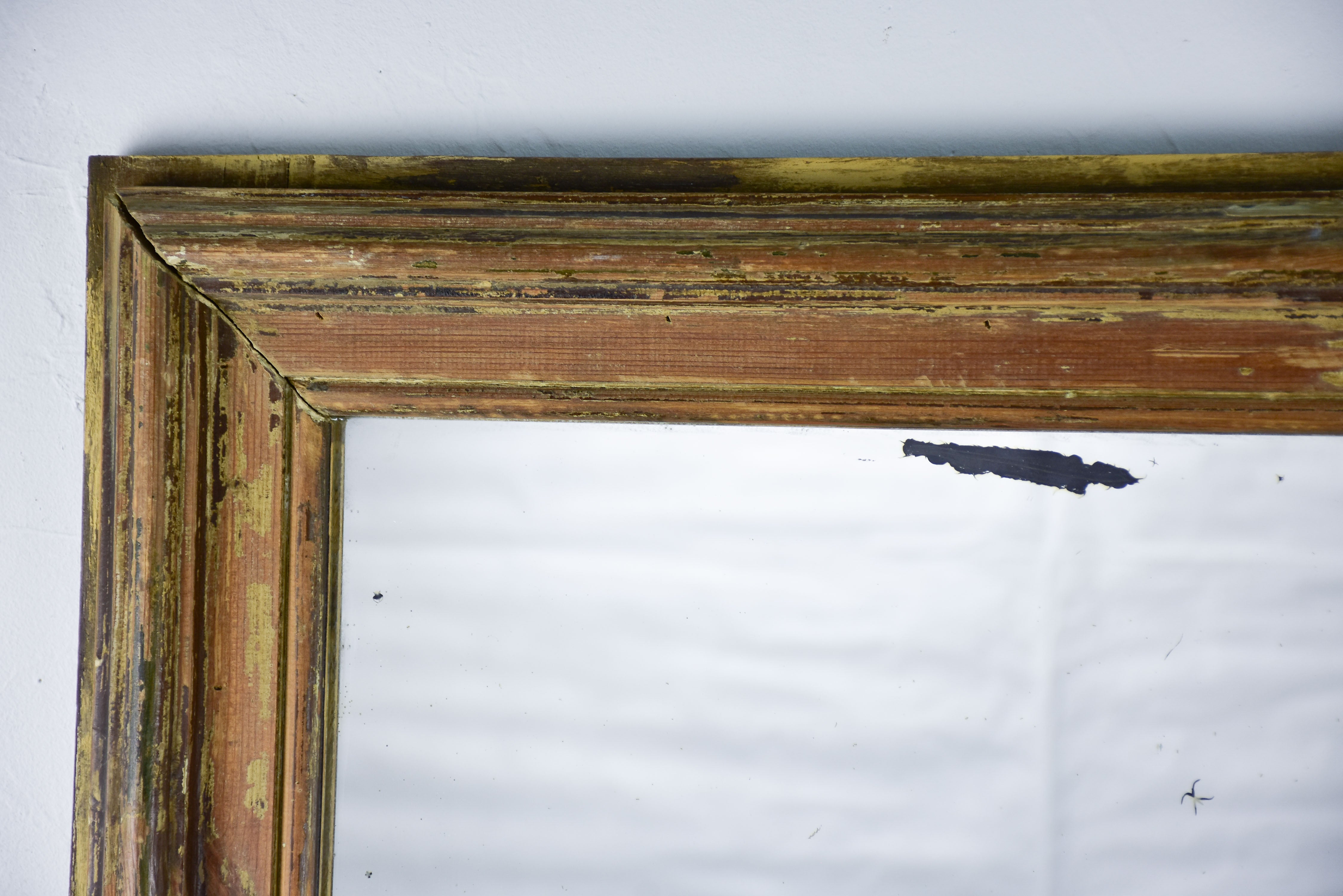 Rustic antique French mirror with dark rectangular frame