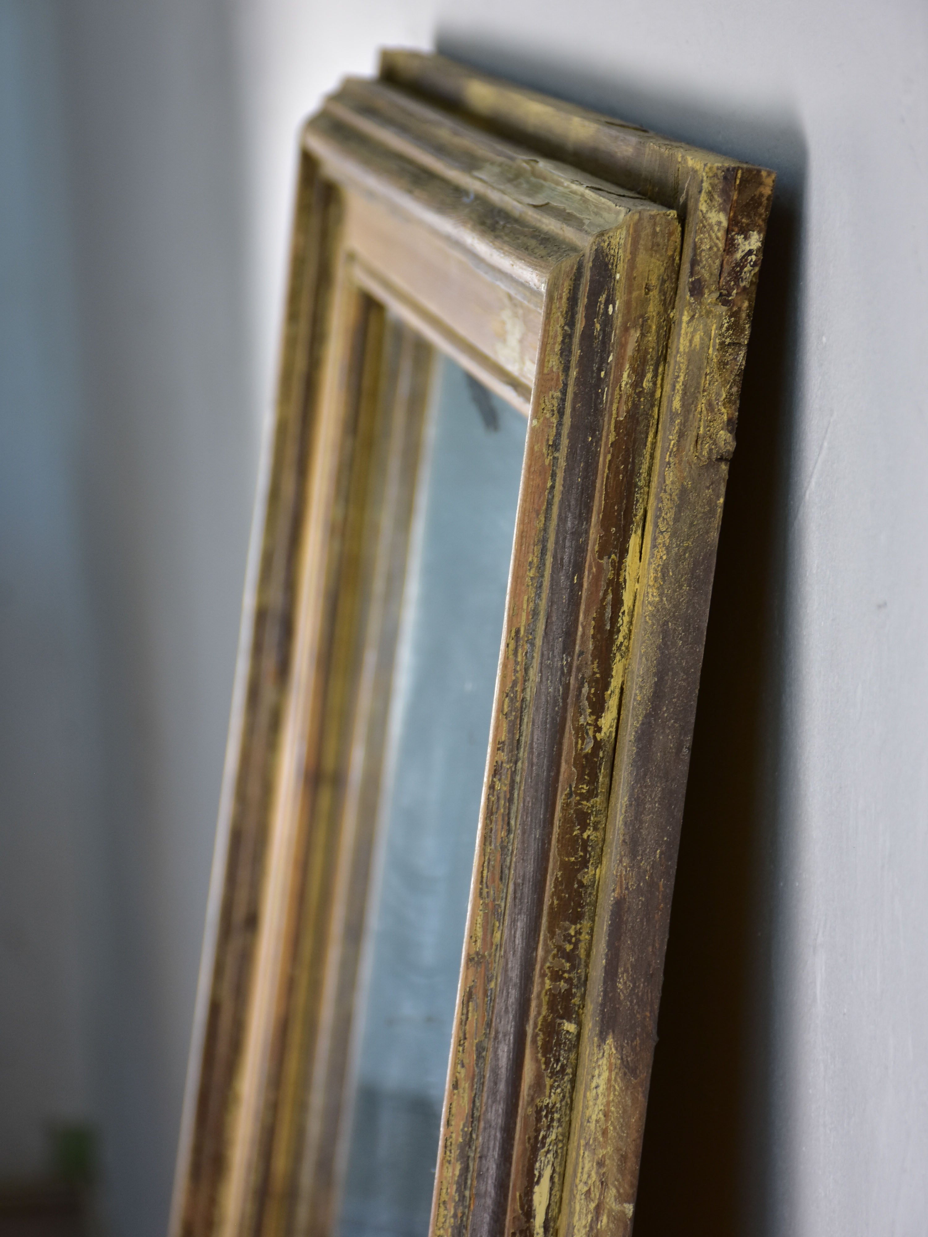 Rustic antique French mirror with dark rectangular frame