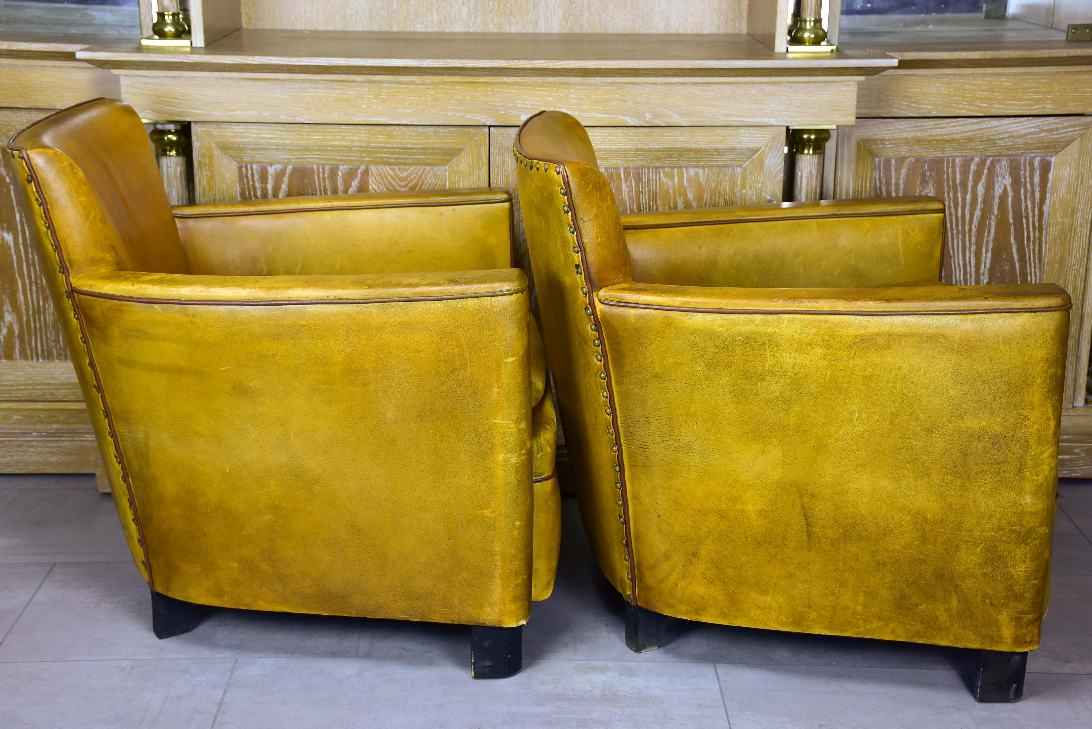 Pair of vintage French leather club chairs