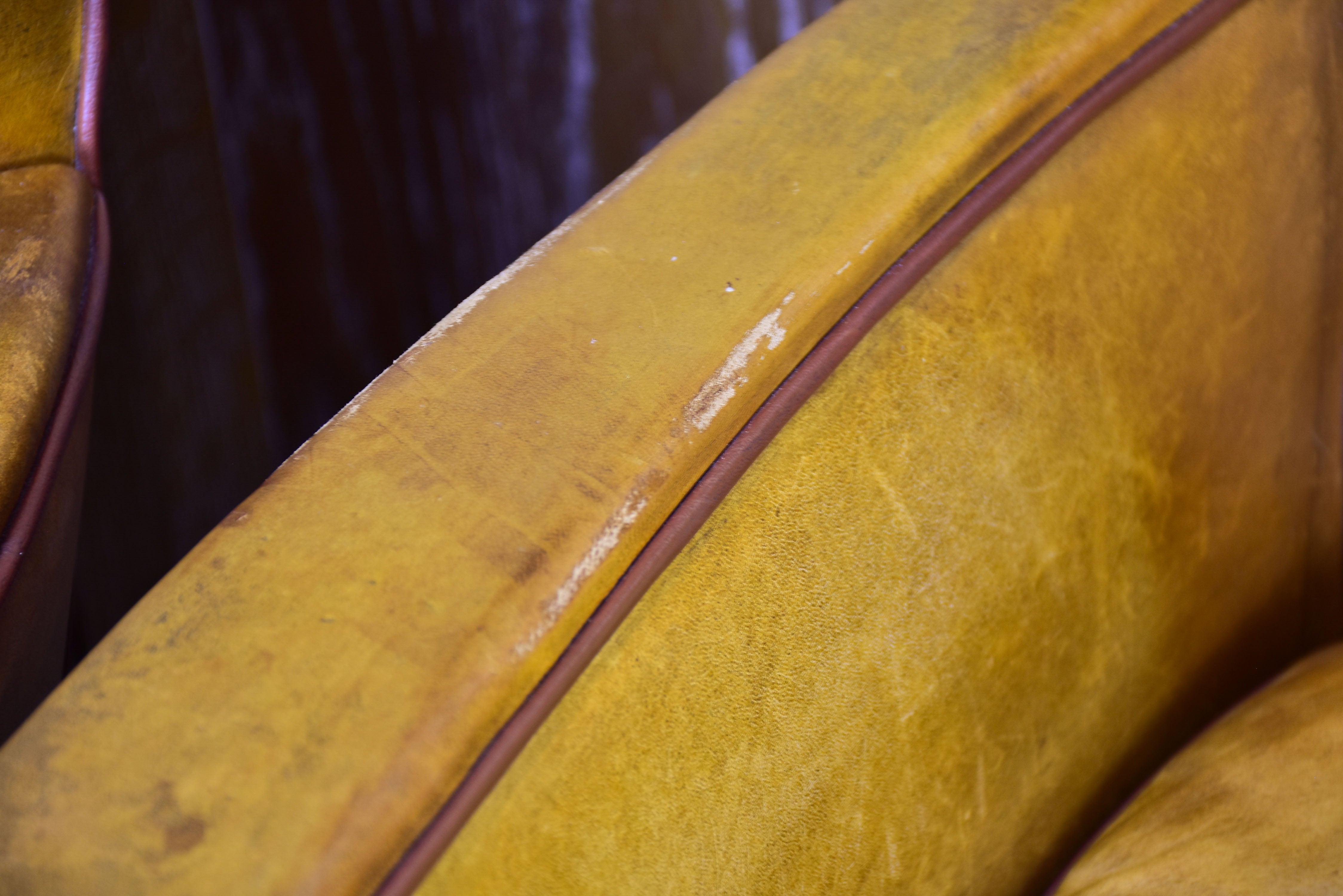 Pair of vintage French leather club chairs