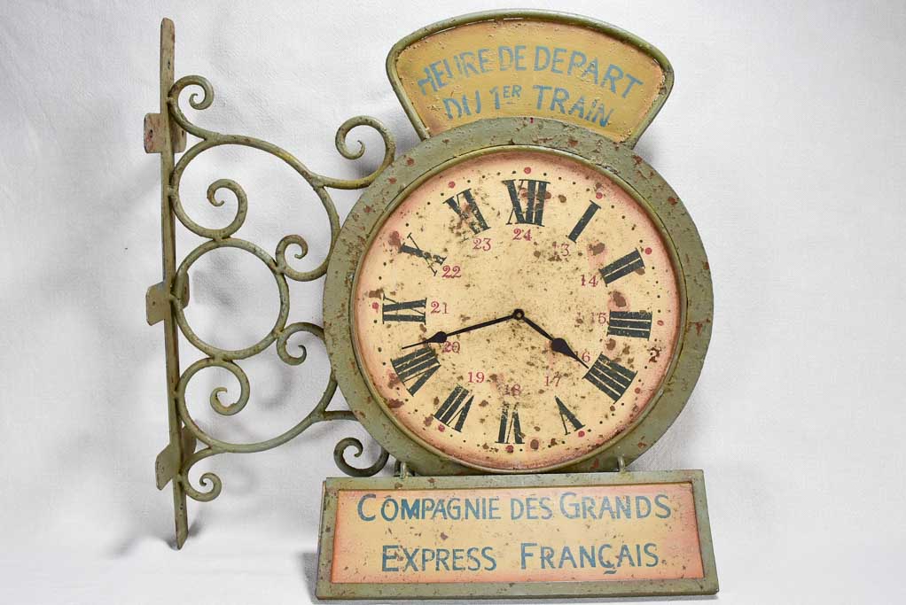 1950s clock and sign from a train station