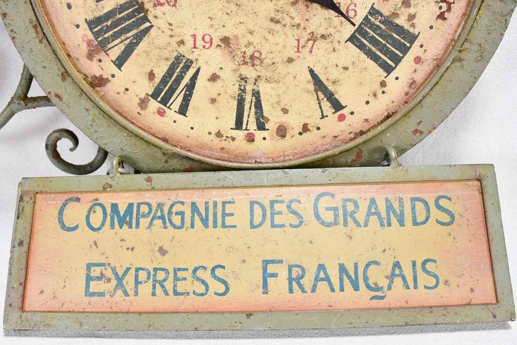 1950s clock and sign from a train station