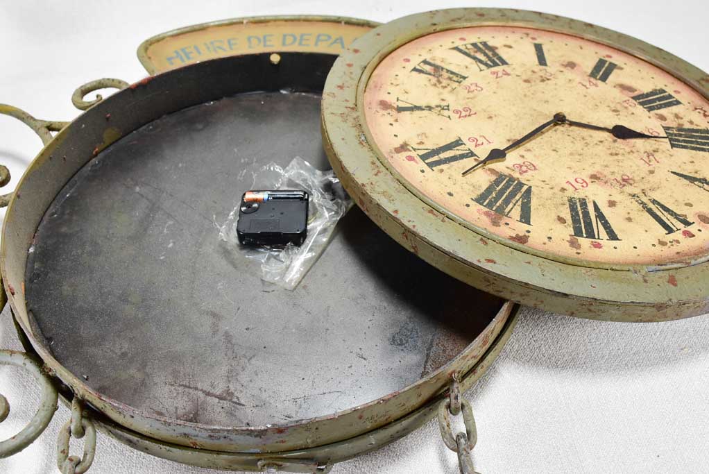 1950s clock and sign from a train station