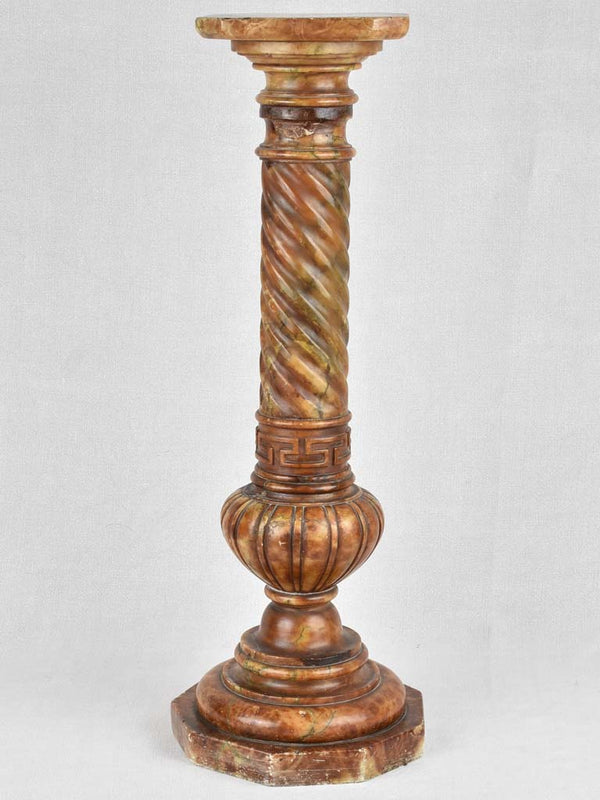 Antique waxed alabaster spiral-legged pedestal