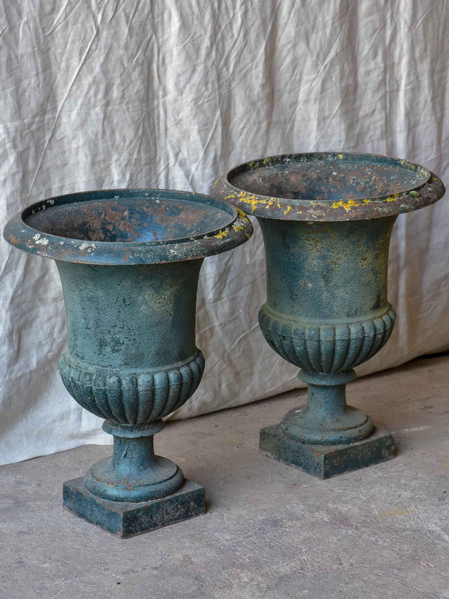Pair of large antique French Medici garden urns with green patina