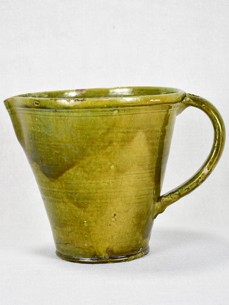 1930's ceramic pitcher with green glaze 8"