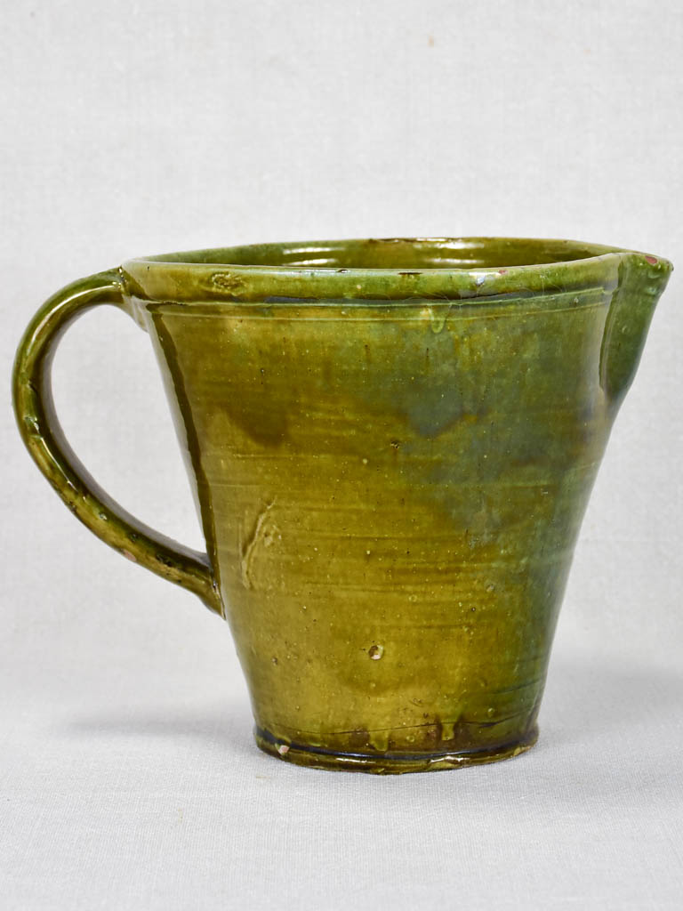 1930's ceramic pitcher with green glaze 8"