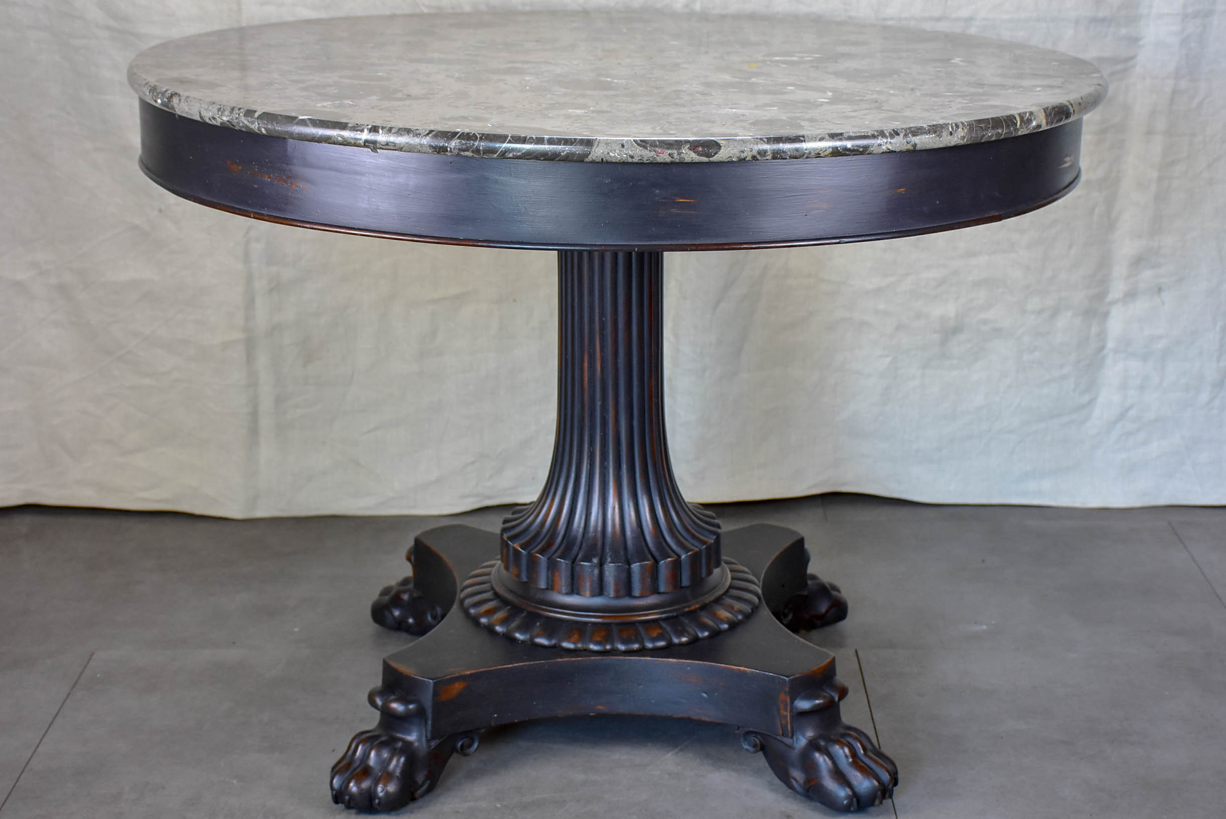 Napoleon III black marble top entry table with claw feet