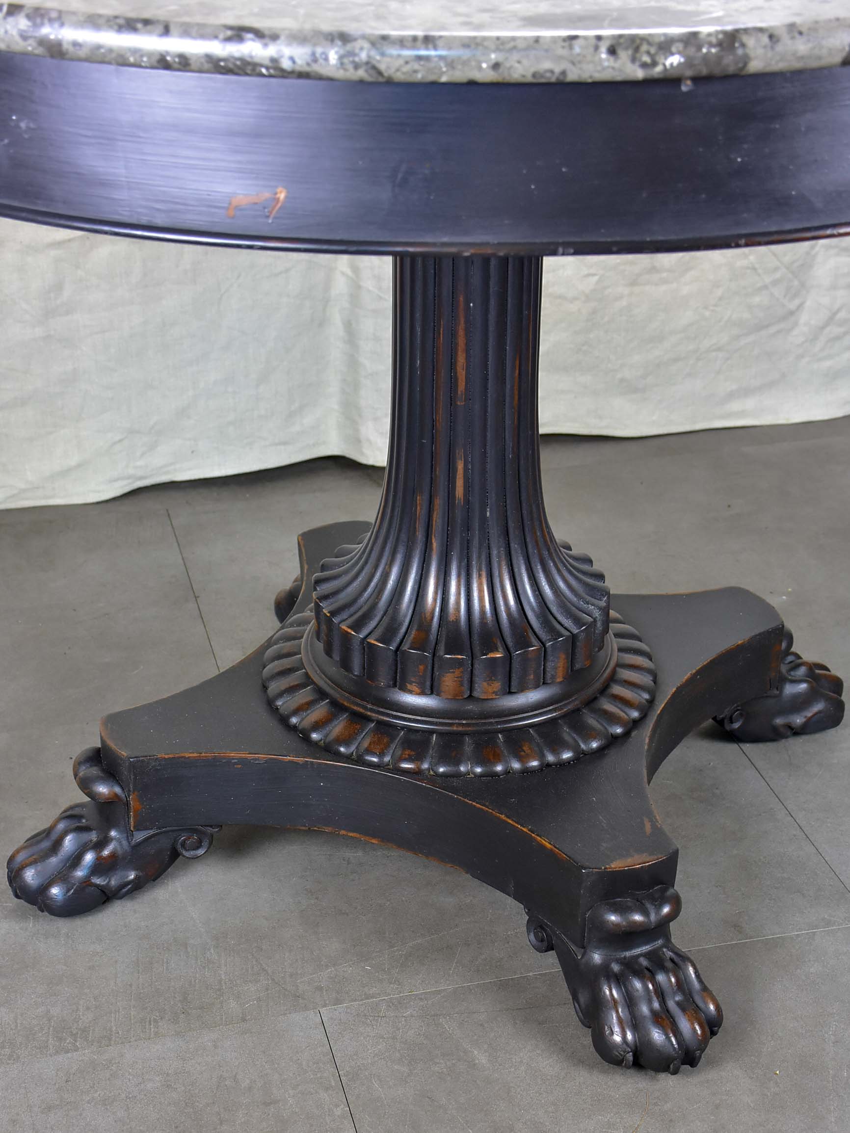 Napoleon III black marble top entry table with claw feet
