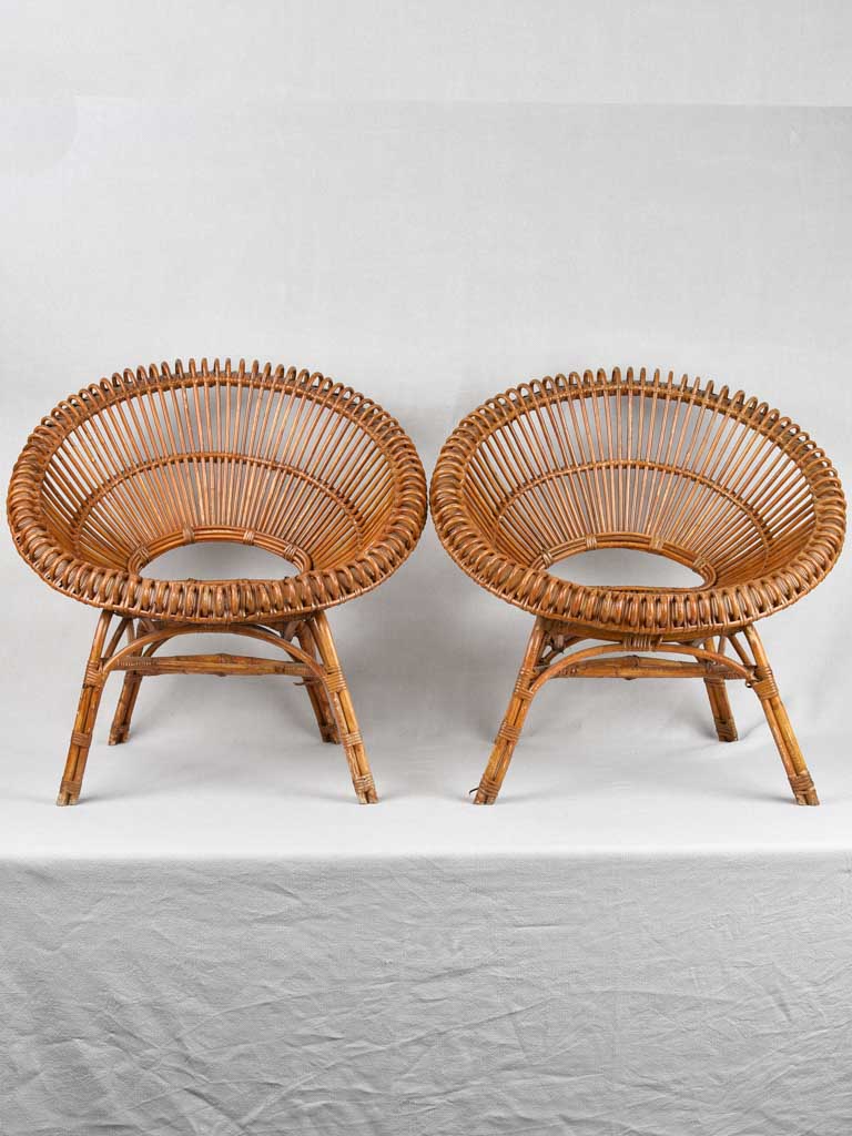 Pair of Janine Abraham wicker 'sunburst' armchairs