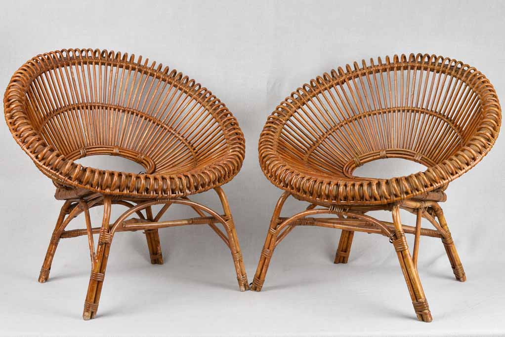 Pair of Janine Abraham wicker 'sunburst' armchairs