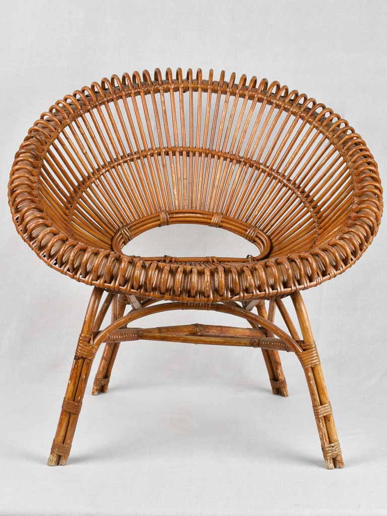 Pair of Janine Abraham wicker 'sunburst' armchairs