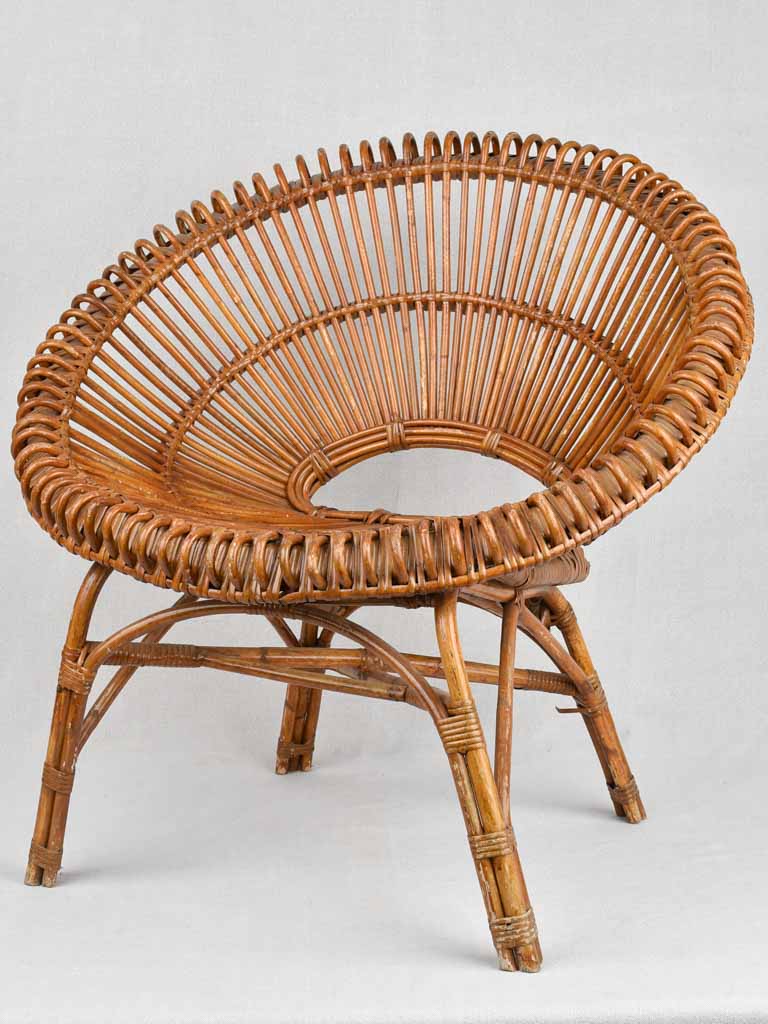 Pair of Janine Abraham wicker 'sunburst' armchairs