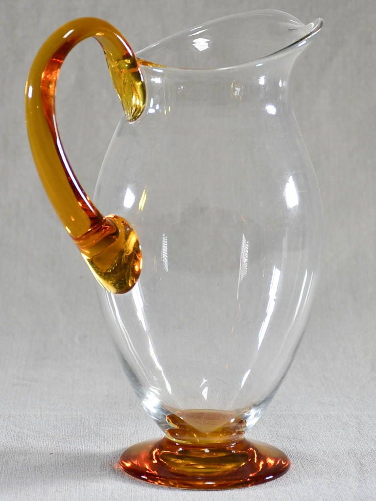 Set of eight tumblers with matching pitcher - clear and amber glass