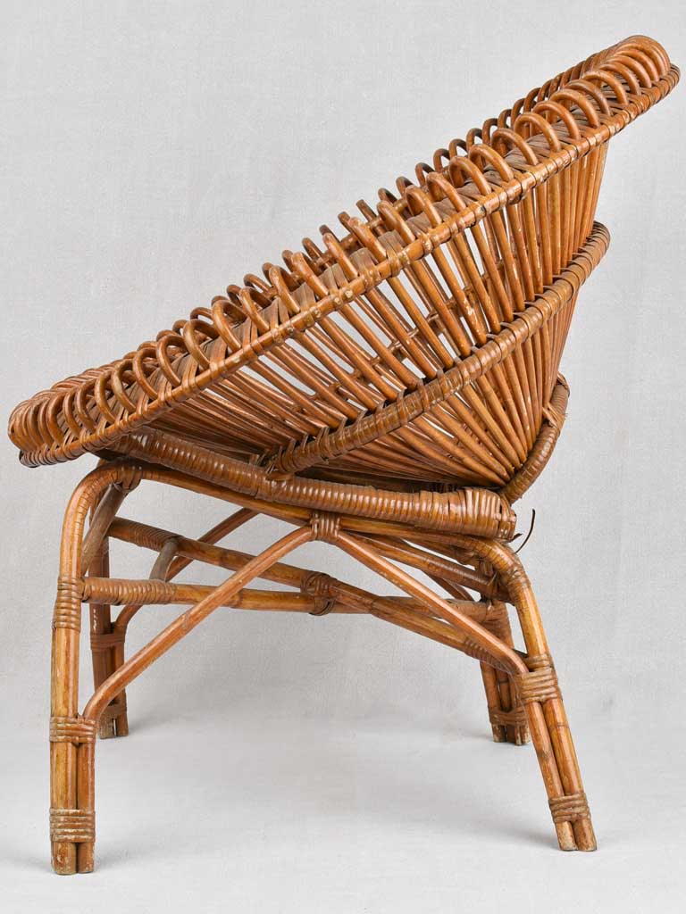 Pair of Janine Abraham wicker 'sunburst' armchairs